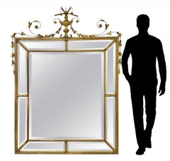 Monumentaler Wandspiegel aus geschnitztem Giltwood im Adams-Stil.