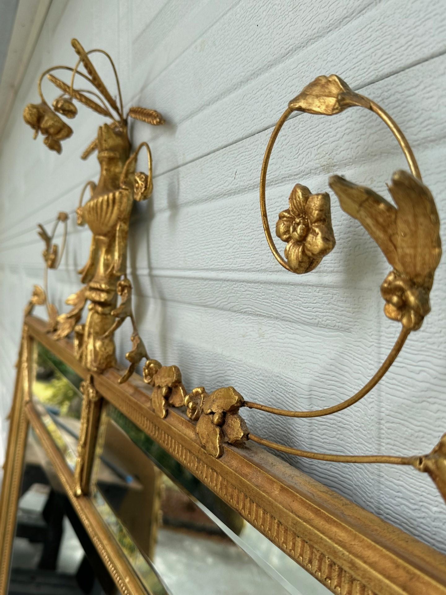 20th Century Monumental Adams Style Carved Giltwood Wall Mirror. For Sale