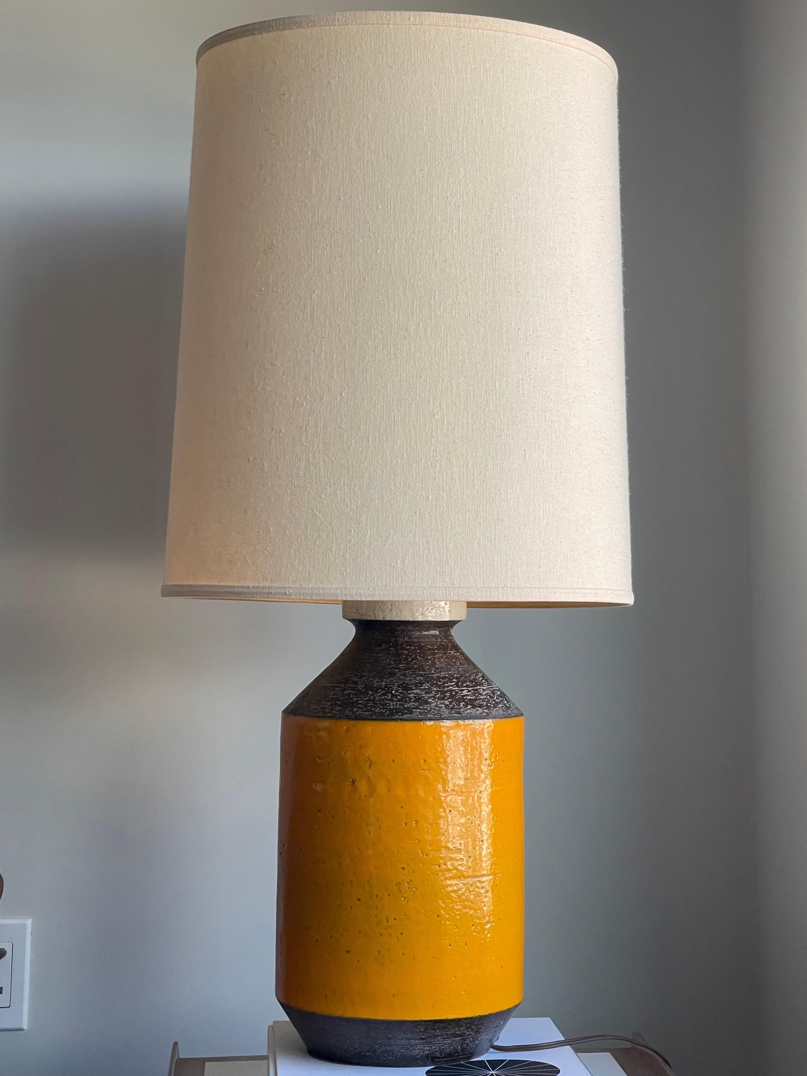 Excellent large orange, white and dark clay lamp by Aldo Londi Raymor. 
Spectacular. 
Signed 
16” tall by 8” diameter. 26