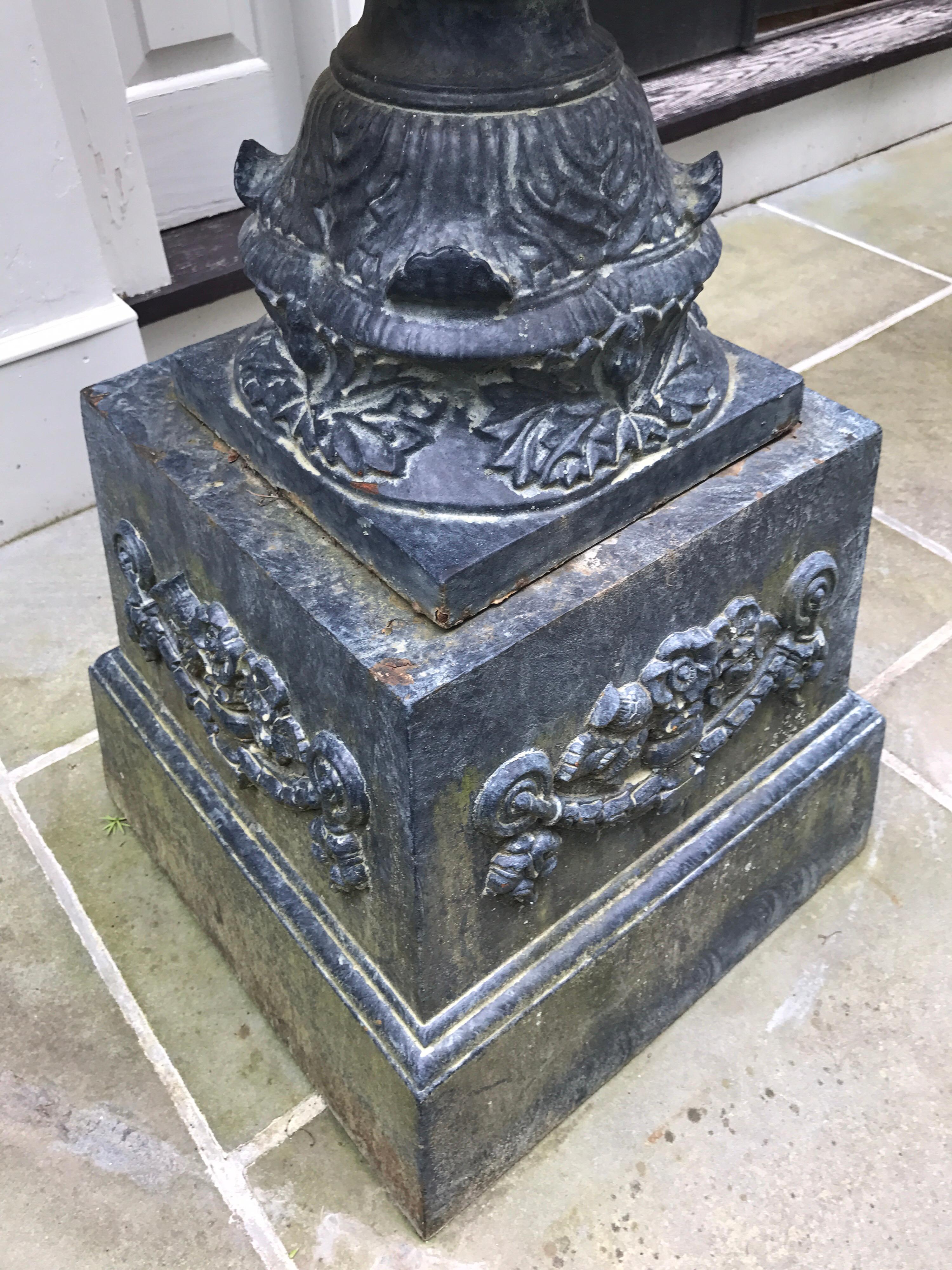 Monumental Antique Covered Cast Iron Urns on Plinths and Lion Head Handles, Pair In Excellent Condition In West Hartford, CT