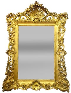 Monumental Antique French Louis XV Style Carved Giltwood Mirror