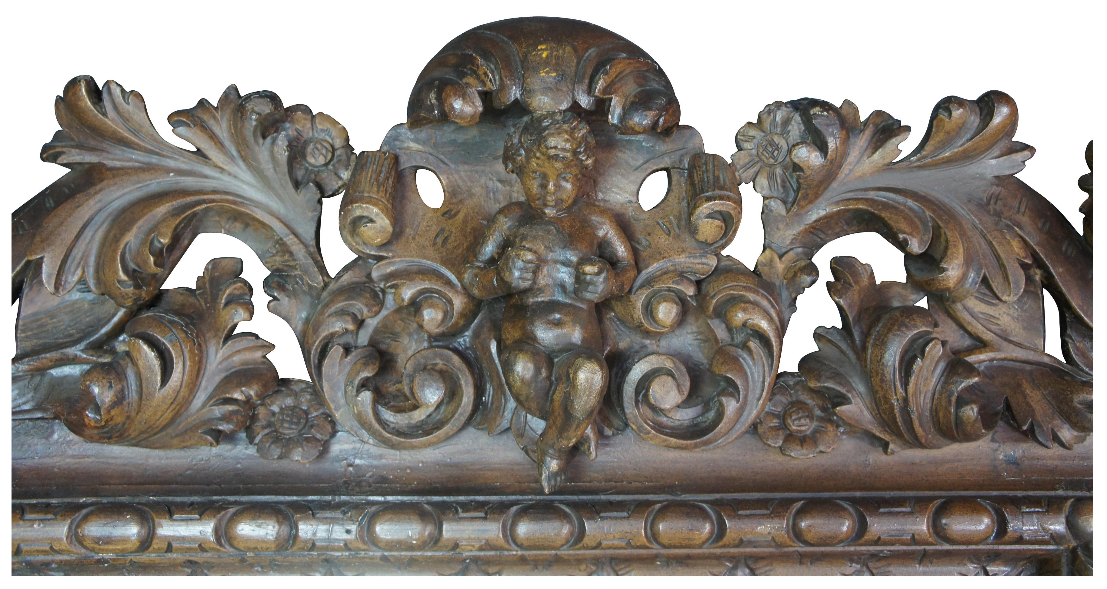 Monumental Antique Italian Baroque High Relief Carved Figural Cherub Mirror In Good Condition For Sale In Dayton, OH