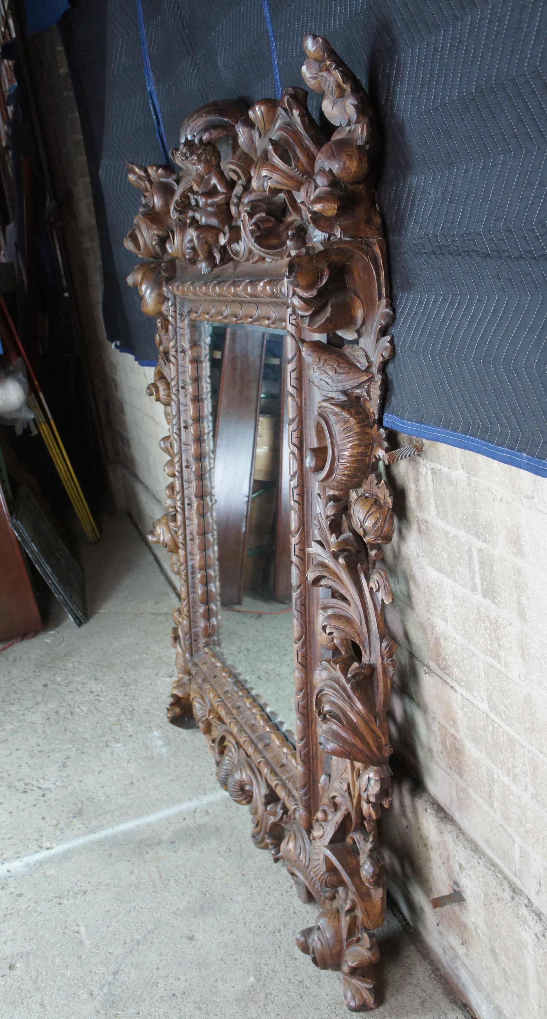 20th Century Monumental Antique Italian Baroque High Relief Carved Figural Cherub Mirror For Sale