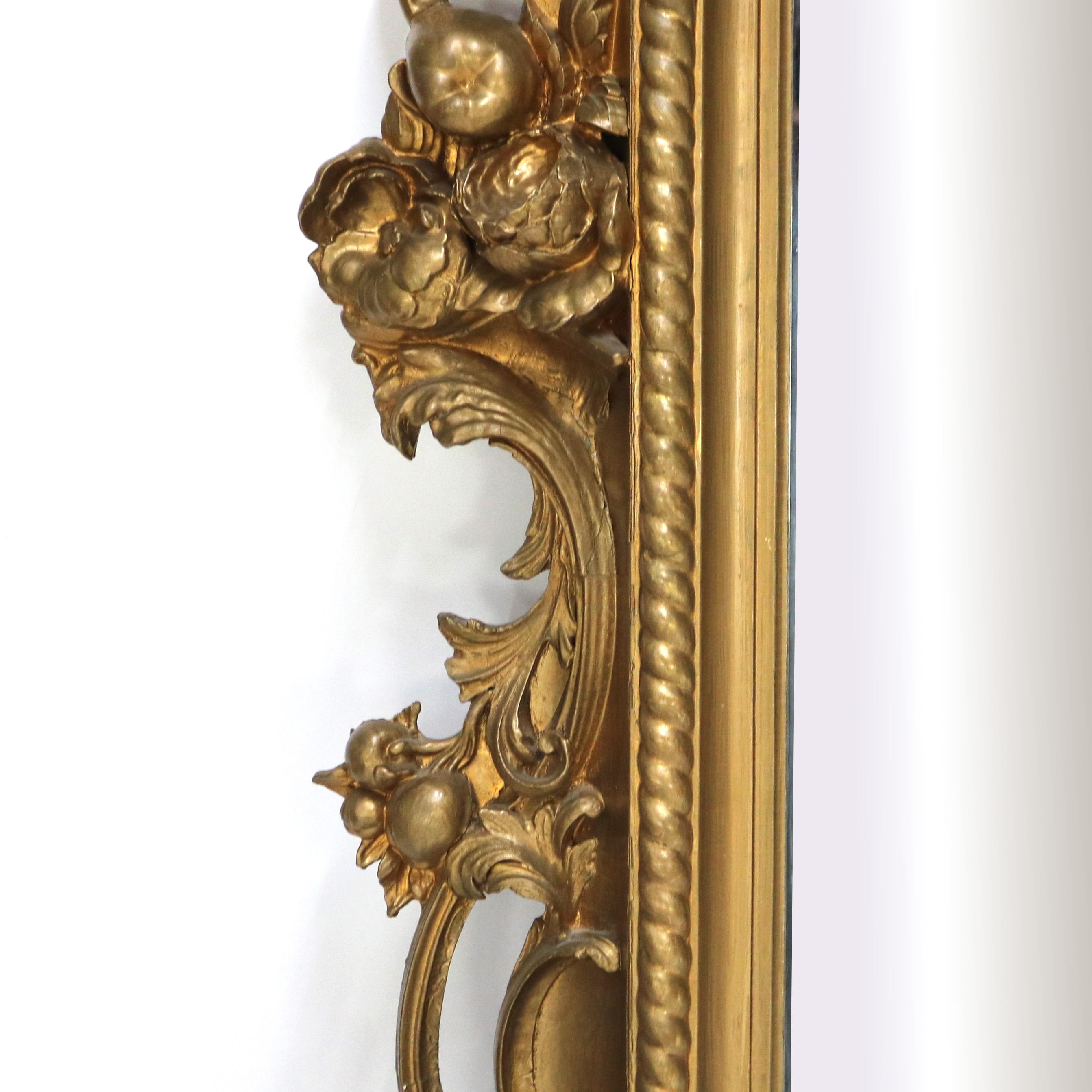 XIXe siècle Monumental miroir de pilier ancien de style Louis XIV en bois doré fortement sculpté, vers 1890 en vente