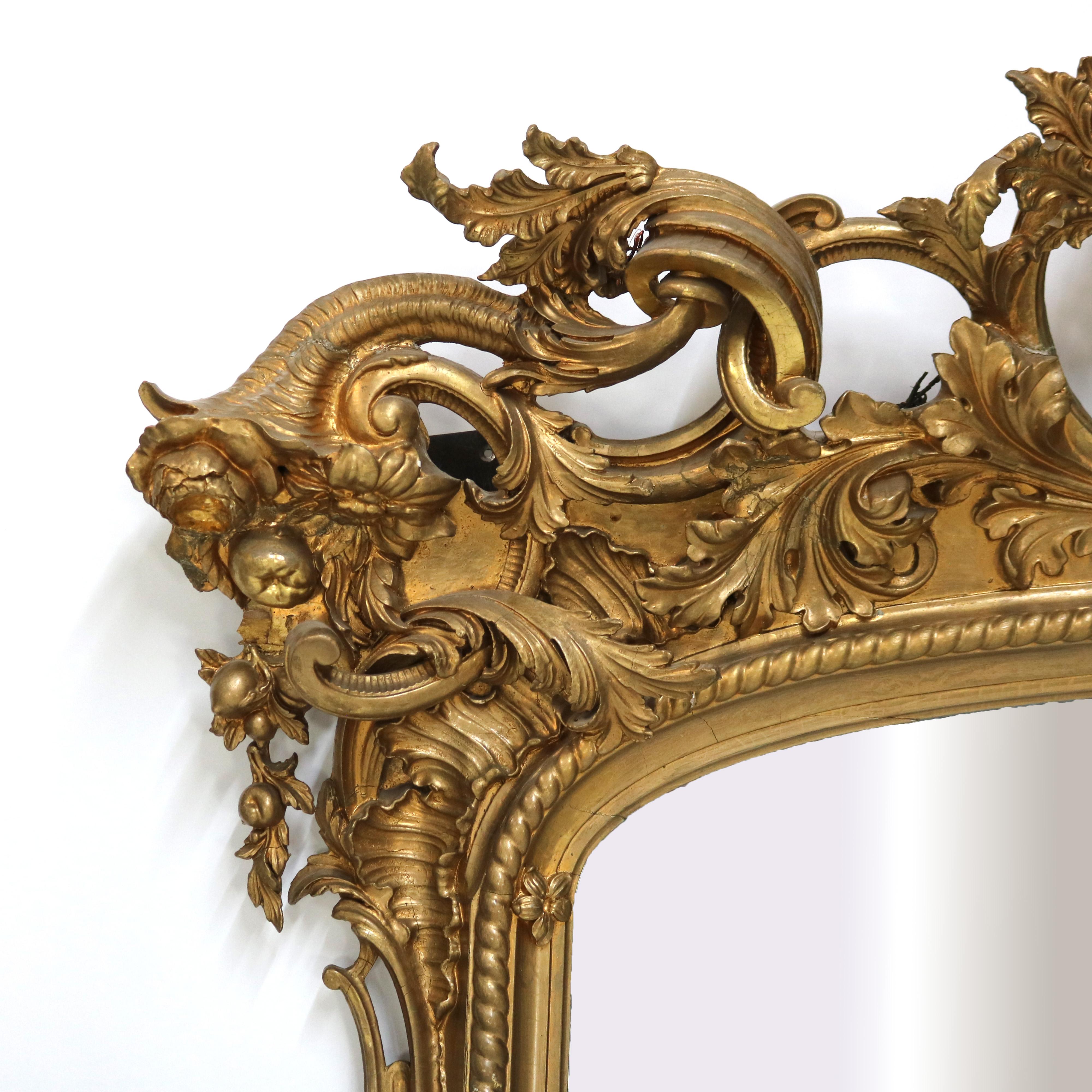 Miroir Monumental miroir de pilier ancien de style Louis XIV en bois doré fortement sculpté, vers 1890 en vente