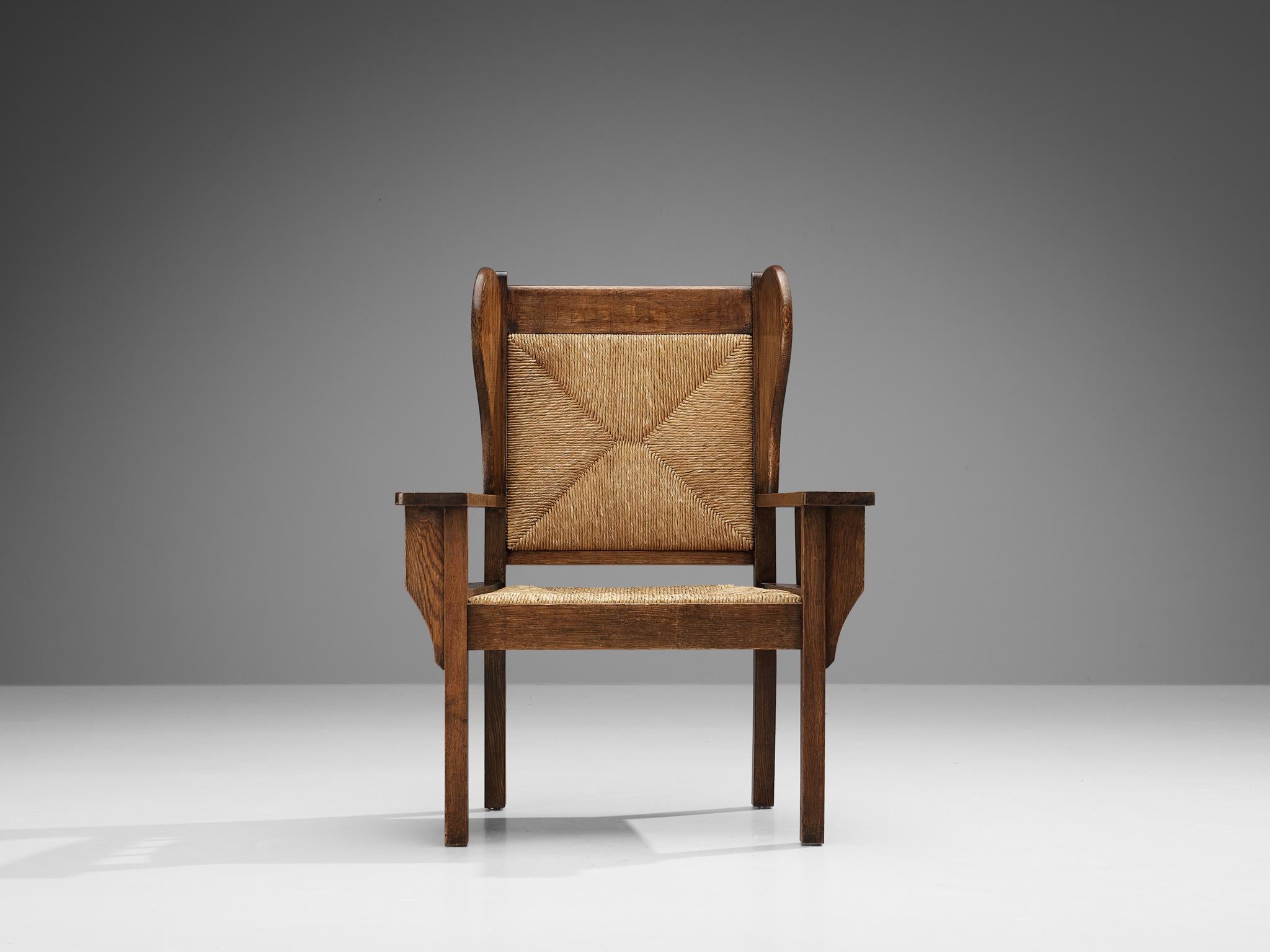 Art Deco Monumental Armchair in Oak and Rush  For Sale