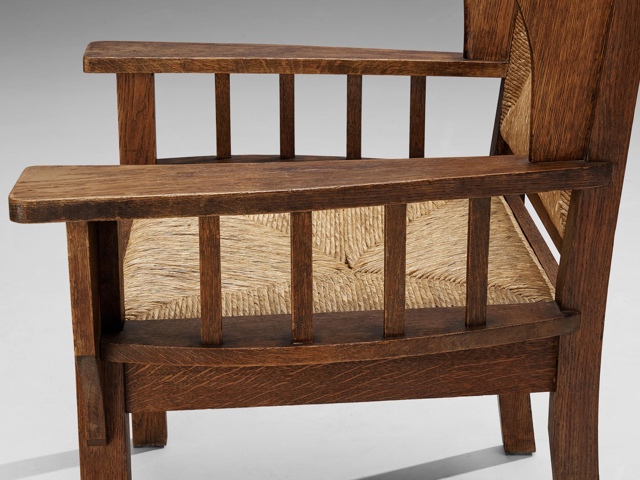 European Monumental Armchair in Oak and Rush  For Sale