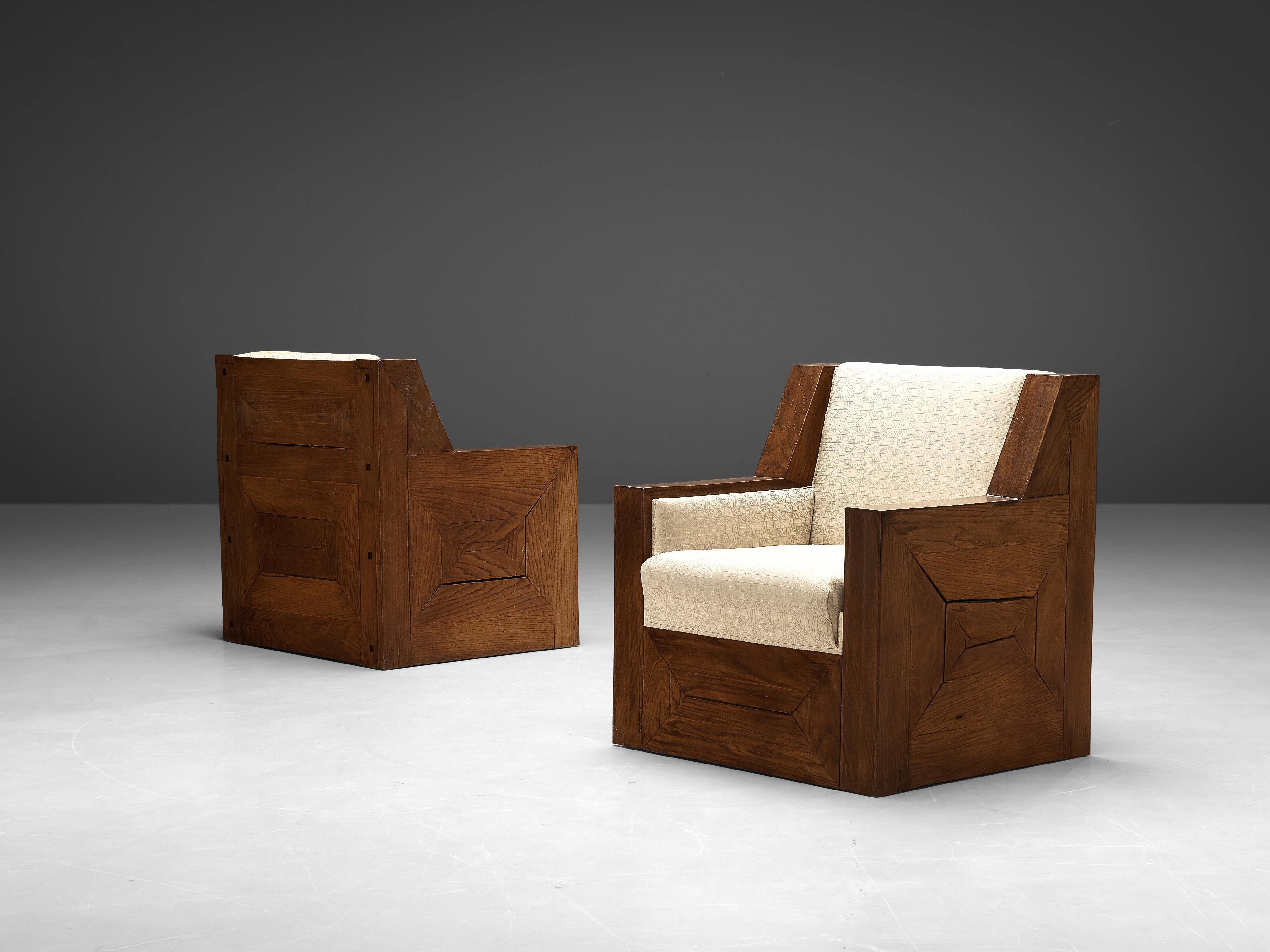 Lounge chairs, pine, fabric upholstery, Europe, 1930s

Grand Art Deco lounge chairs in veneered pine and fabric upholstery. The thick wooden frames create an expressive contrast with the subtle patterned fabric upholstery. A geometric pattern