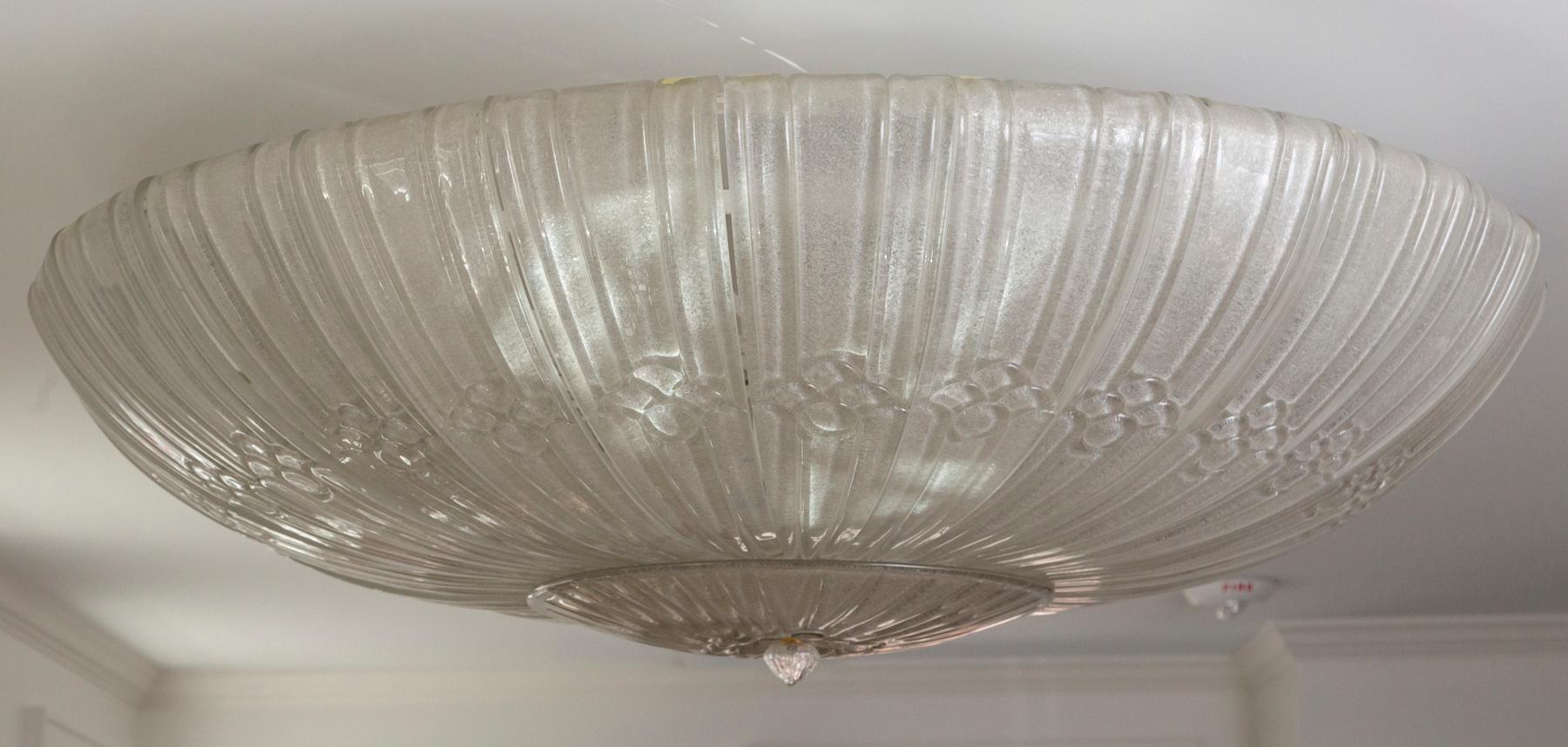 Rare opportunity to offer a very thickly blown icy warm off-white Murano ceiling fixture by Barovier & Toso, blown originally in one piece and then cut into 27 sleeves. Note 26 sleeves are shown installed. The 27th sleeve may be added to close all