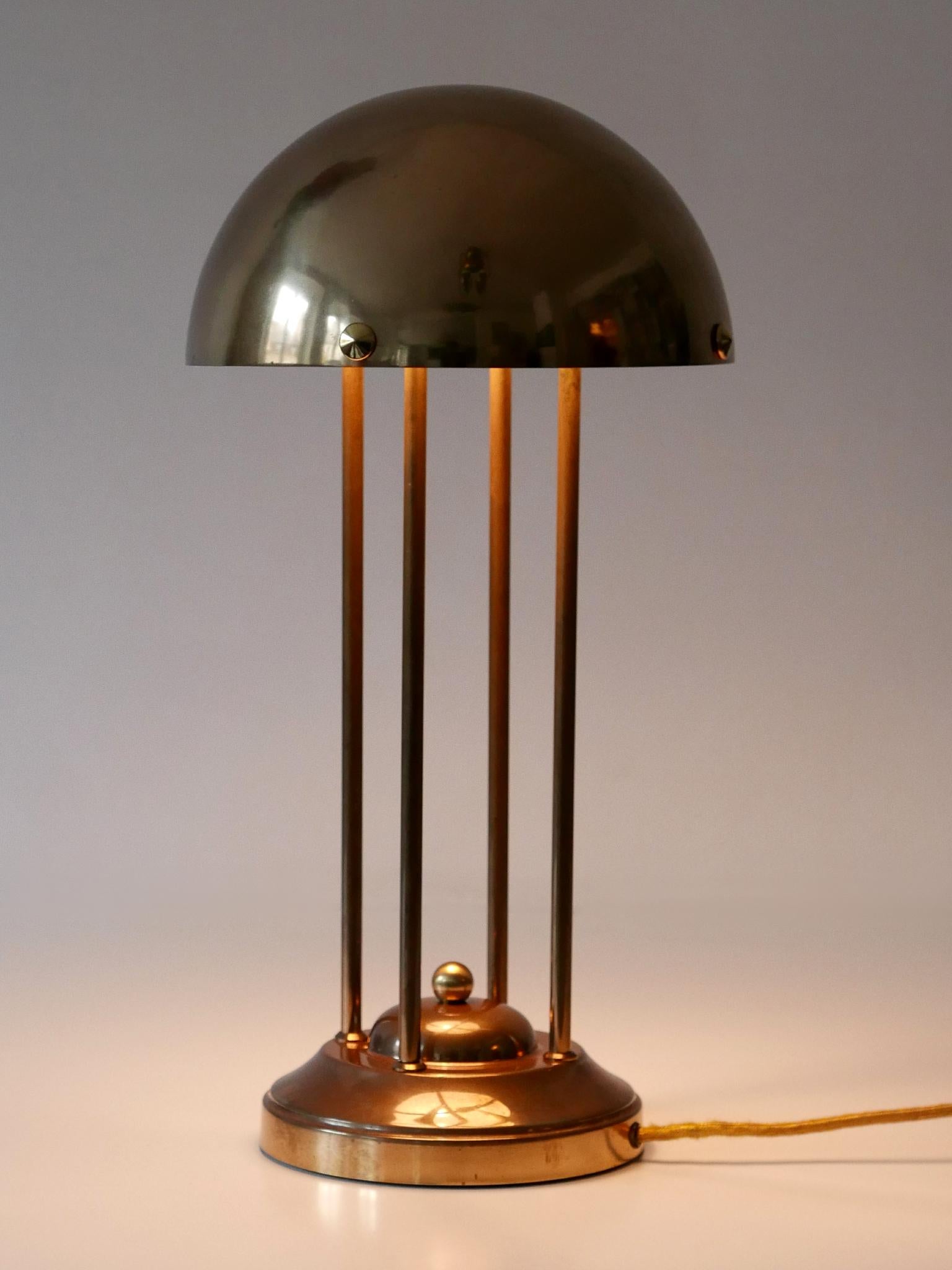 Monumental Art Nouveau table lamp Haus Henneberg HH1. Designed by Josef Hoffmann, 1902, Vienna, Austria. This is probably a later production from 1960s.

This sculptural table lamp is executed in bras. It comes with an E27 / E26 Edison screw fit