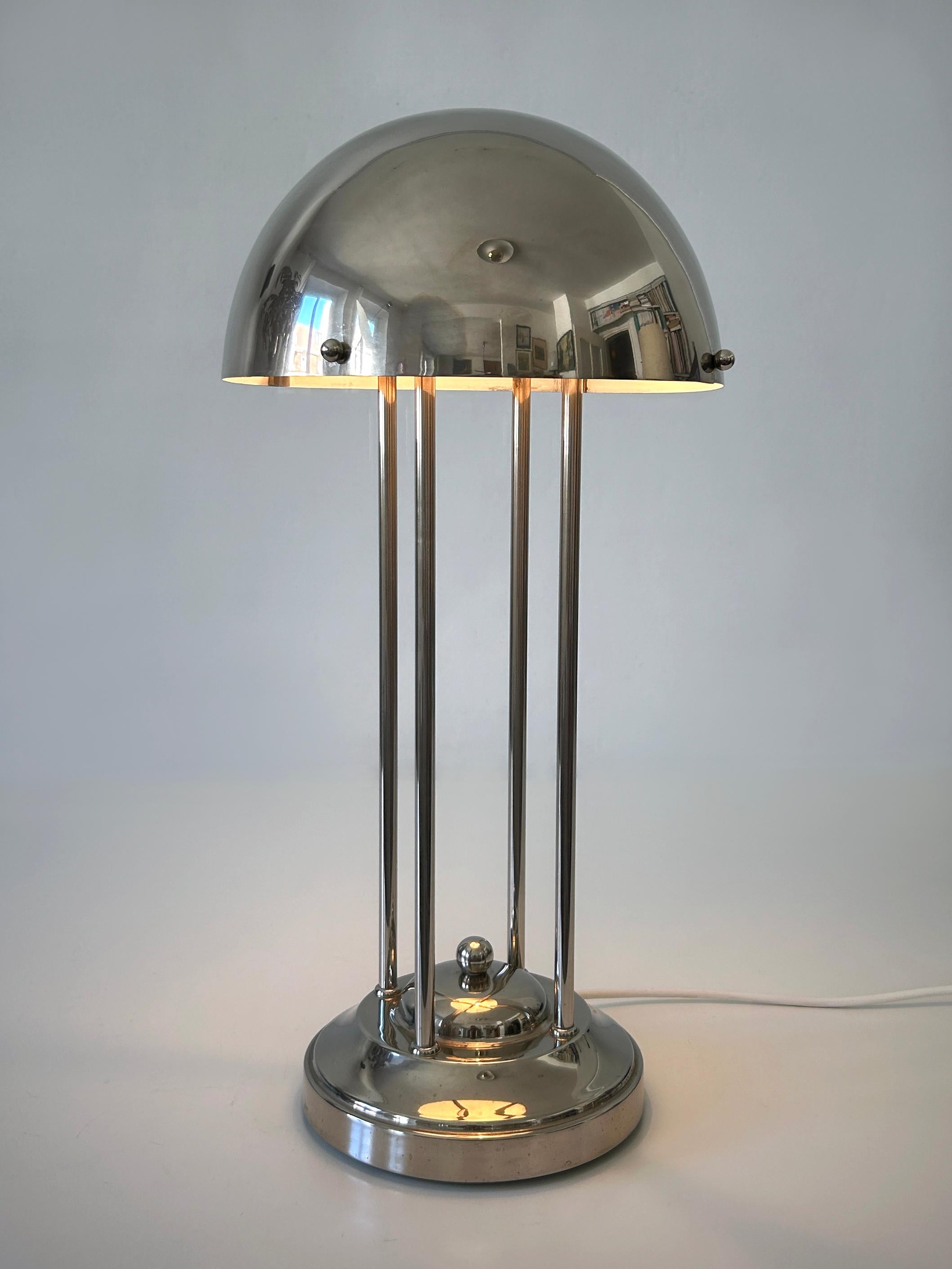 Monumental Art Nouveau table lamp 'Haus Henneberg HH1'. Designed by Josef Hoffmann, 1902, Vienna, Austria. This is probably a later production from 1960s.

This sculptural table lamp is executed in nickel-plated bras. It comes with an E27 / E26