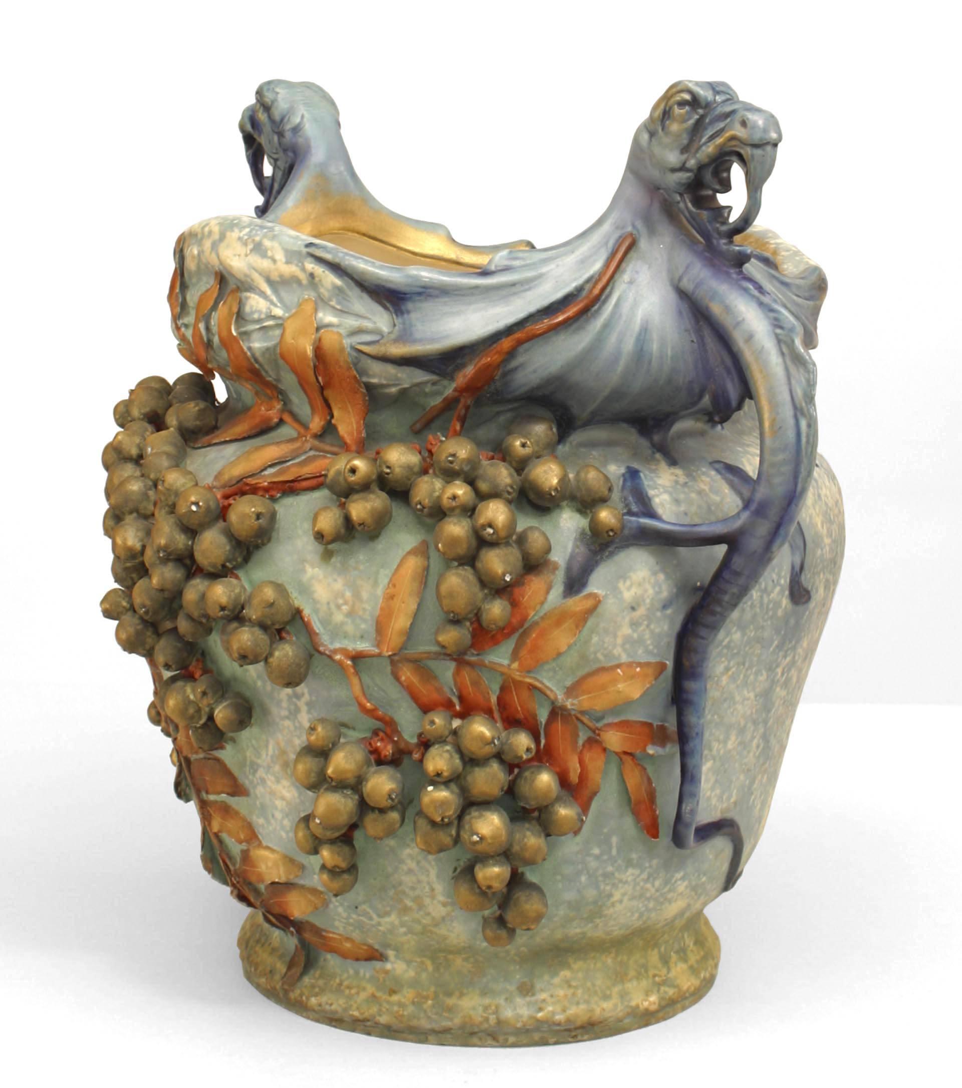 Early 20th century Austrian monumental blue/green Amphora jardiniere with twin cobra handles, decorated with grapes and leave. The work is signed 