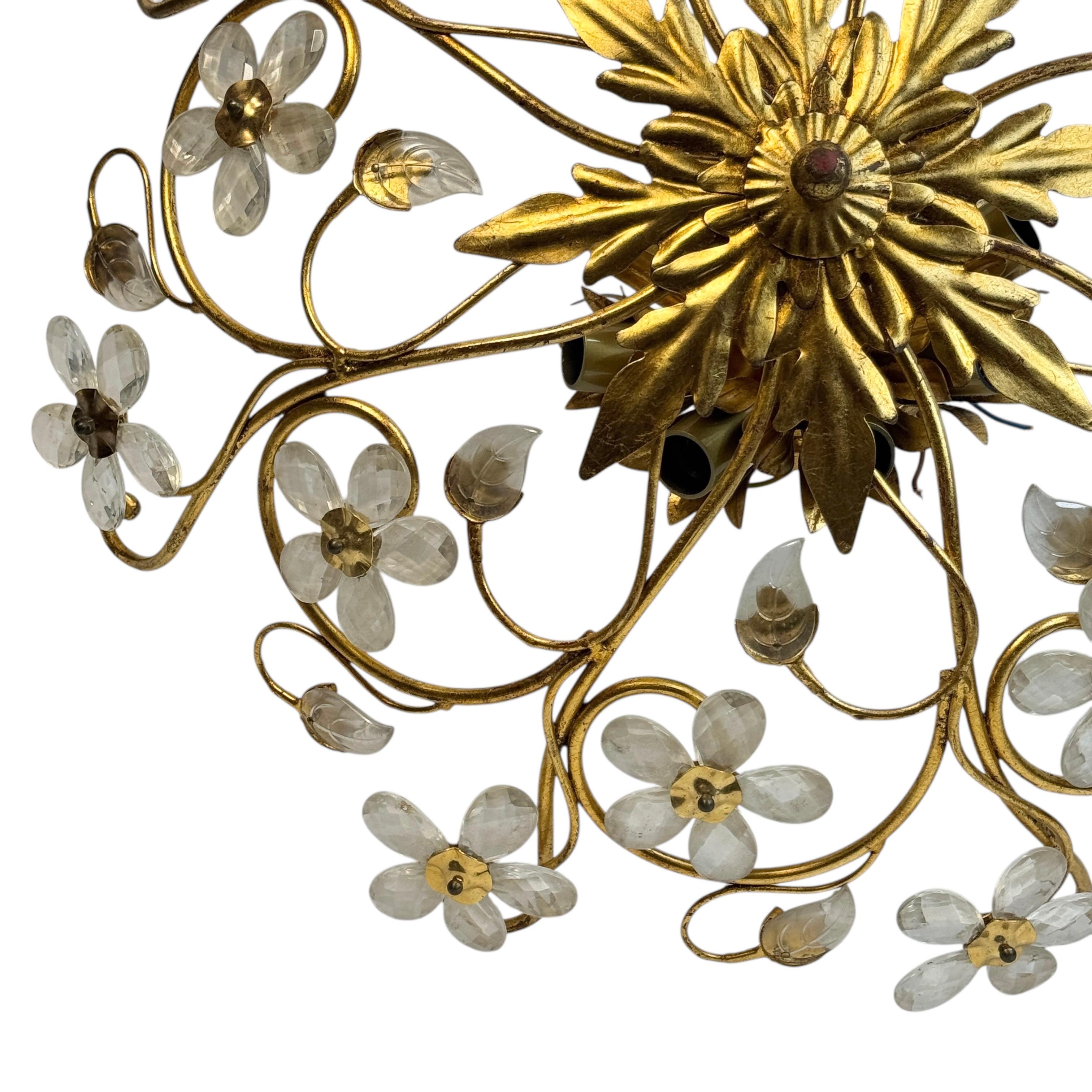 Add a touch of opulence to your home with this charming flush mount light. Perfect stunning gilt acanthus leaf design with clear Murano glass flowers and clear Murano glass leaves on fine gilt stems, to enhance any chic or eclectic home. We'd love