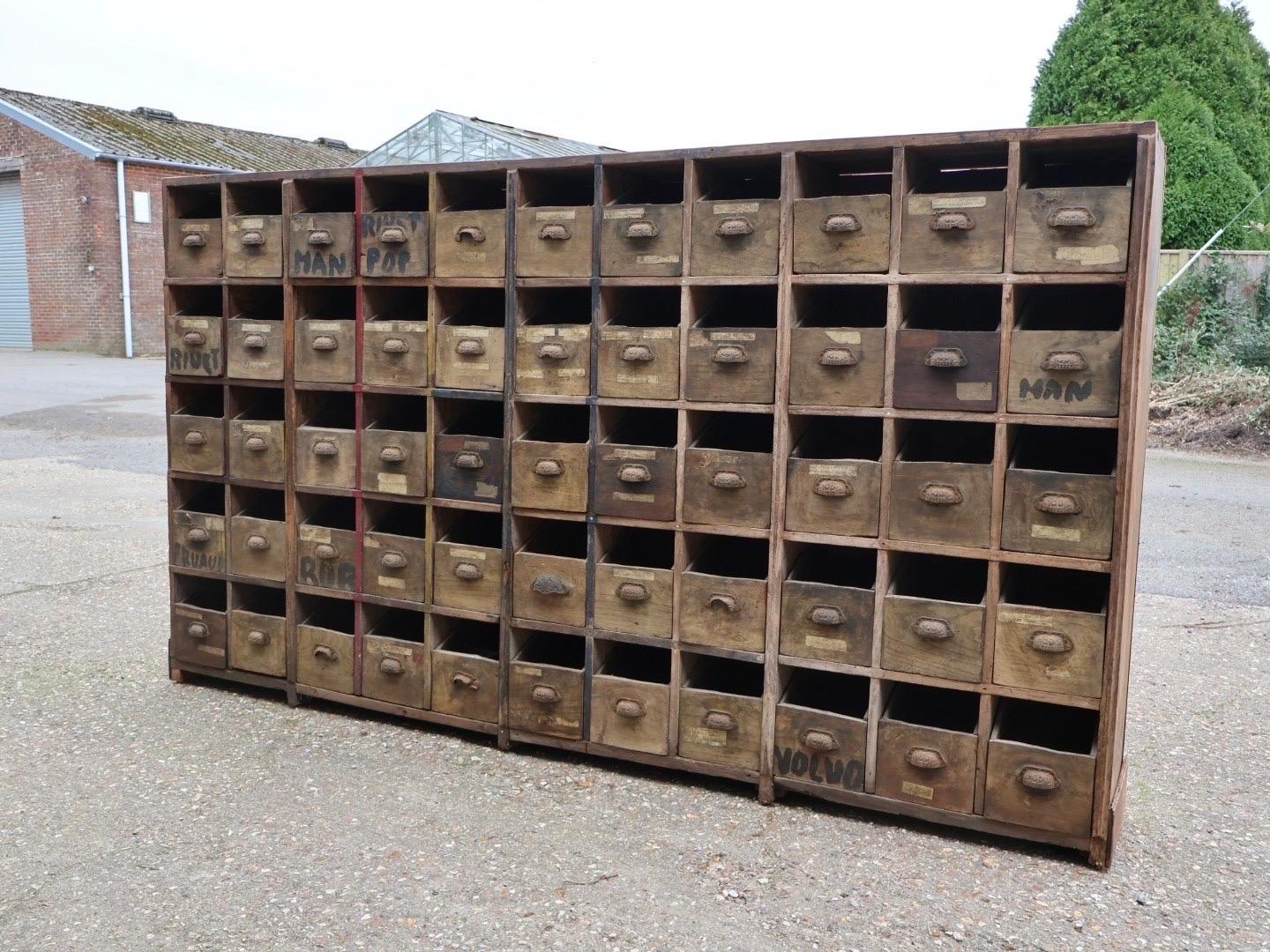 An incredible, 19thc bank of solid elm drawers, originally from a French farm were they housed seeds and feeds, then later in the farms workshop.
The drawers are clean and useable.
Each drawer is tapered so the contents can be seen, each drawer with