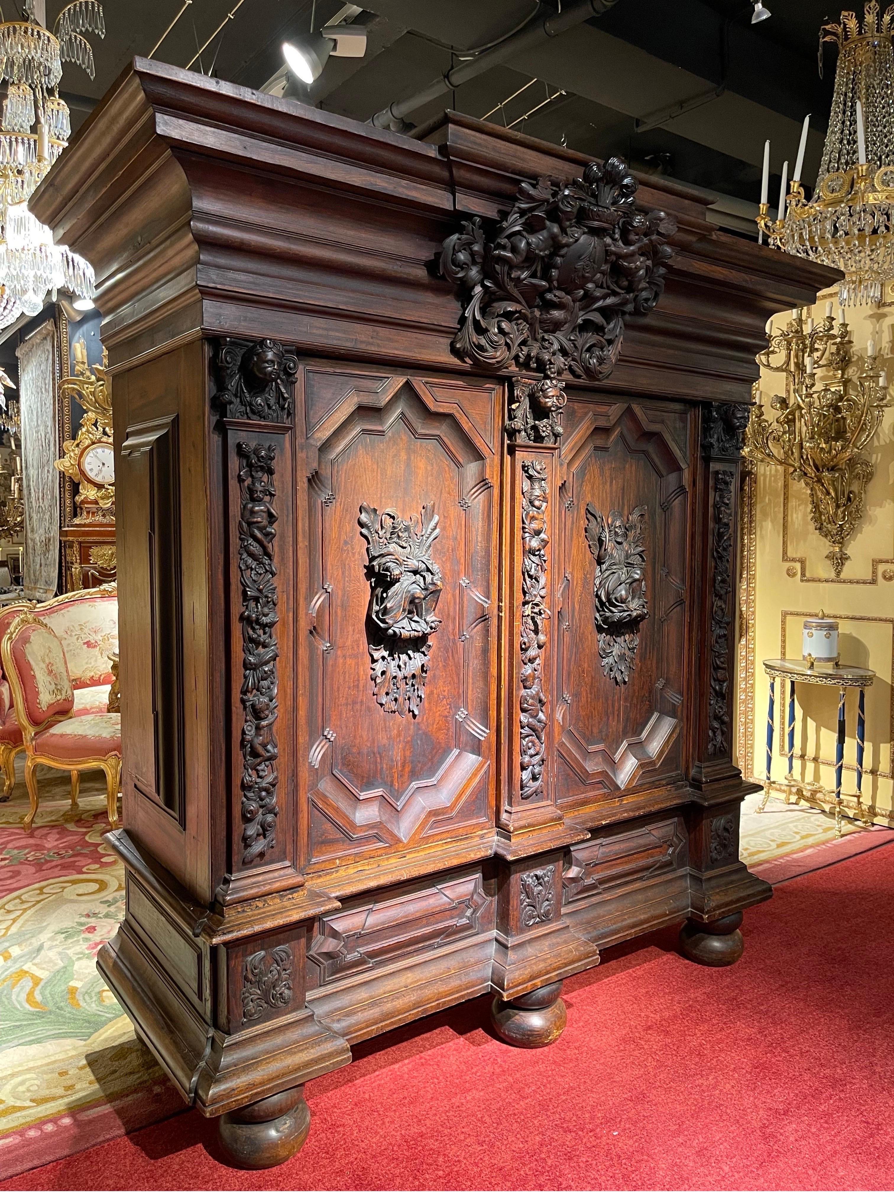 Monumental baroque cabinet, oak, around 1720, North German


High rectangular body made of solid oak body with multi-profiled cornice. In the middle a richly decorated and ornate relief with puttis. Two doors with original box lock and original key.