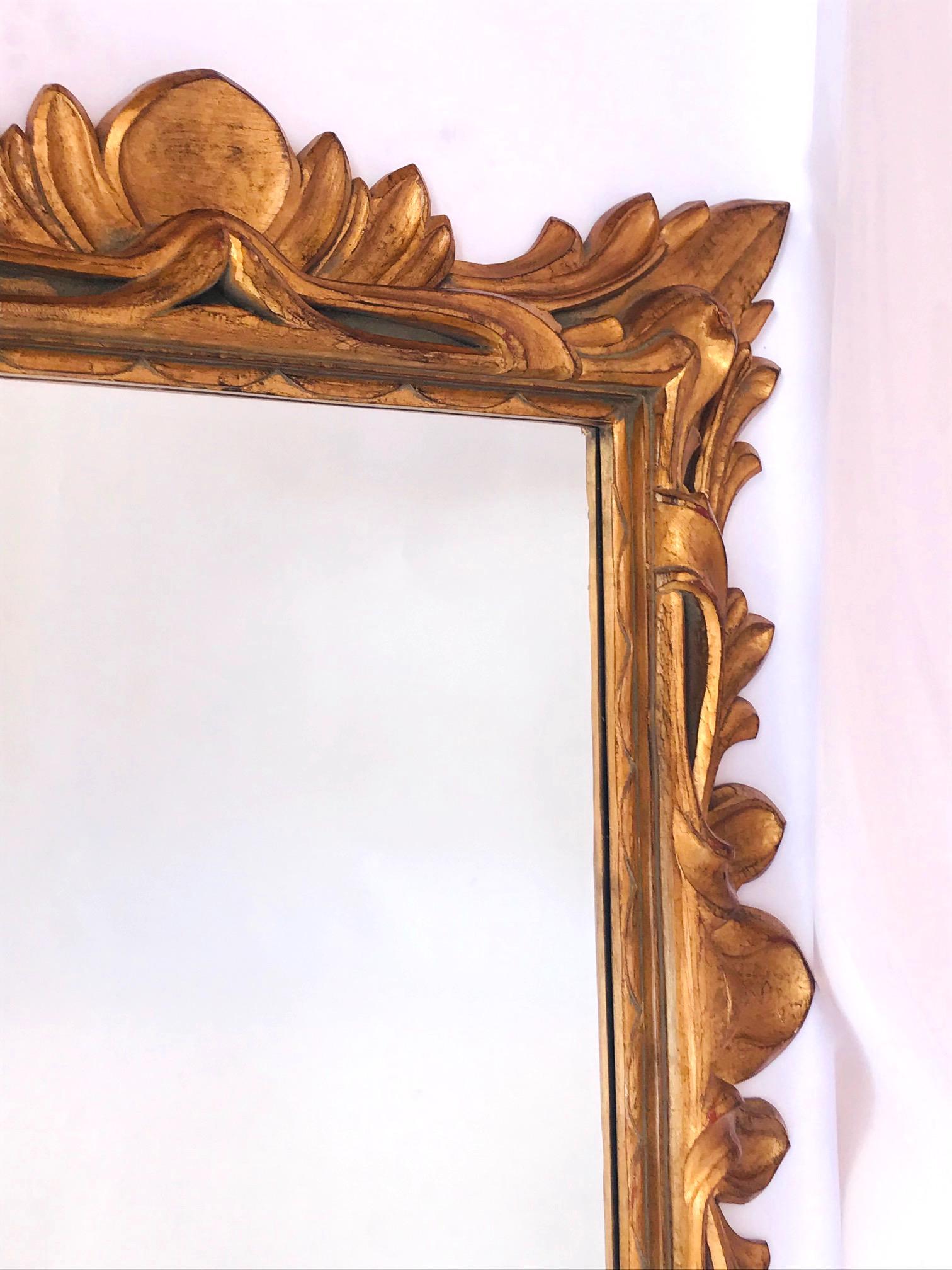 Late 20th Century Monumental Baroque Gold Leaf Mirror with Ornate Carved Frame