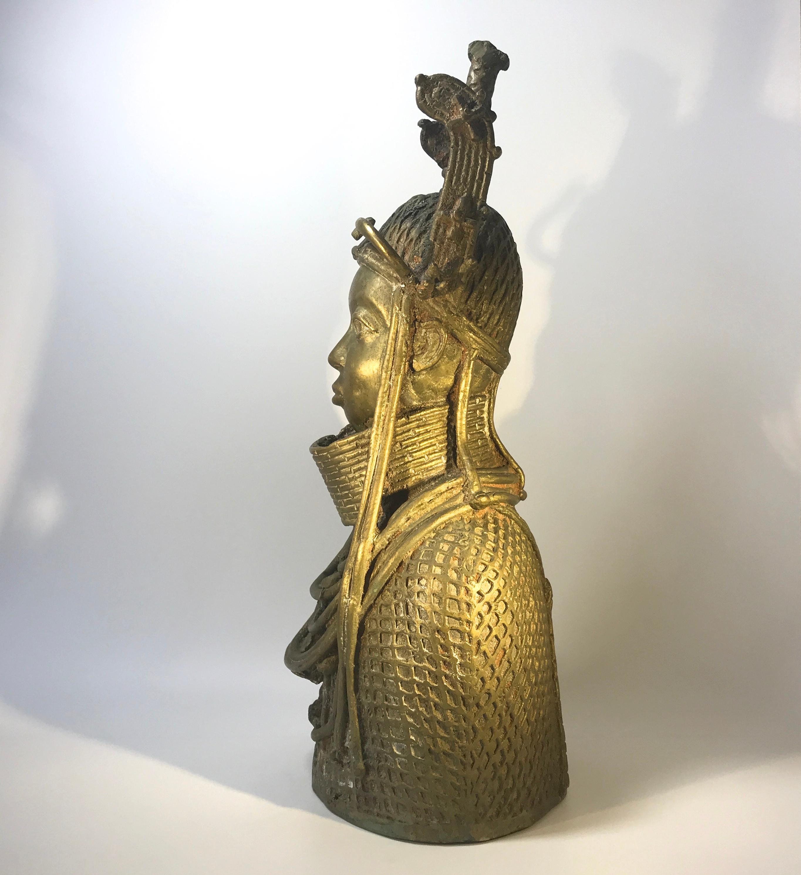 Impressive Benin Oda King Lost Wax 'Bronze' sculpture from the mid-20th century
Centuries old, the 'Lost Wax' method involves a mold created in wax and the molten metal poured in. The wax melts - or is 'lost', leaving the cast piece.
Measures: