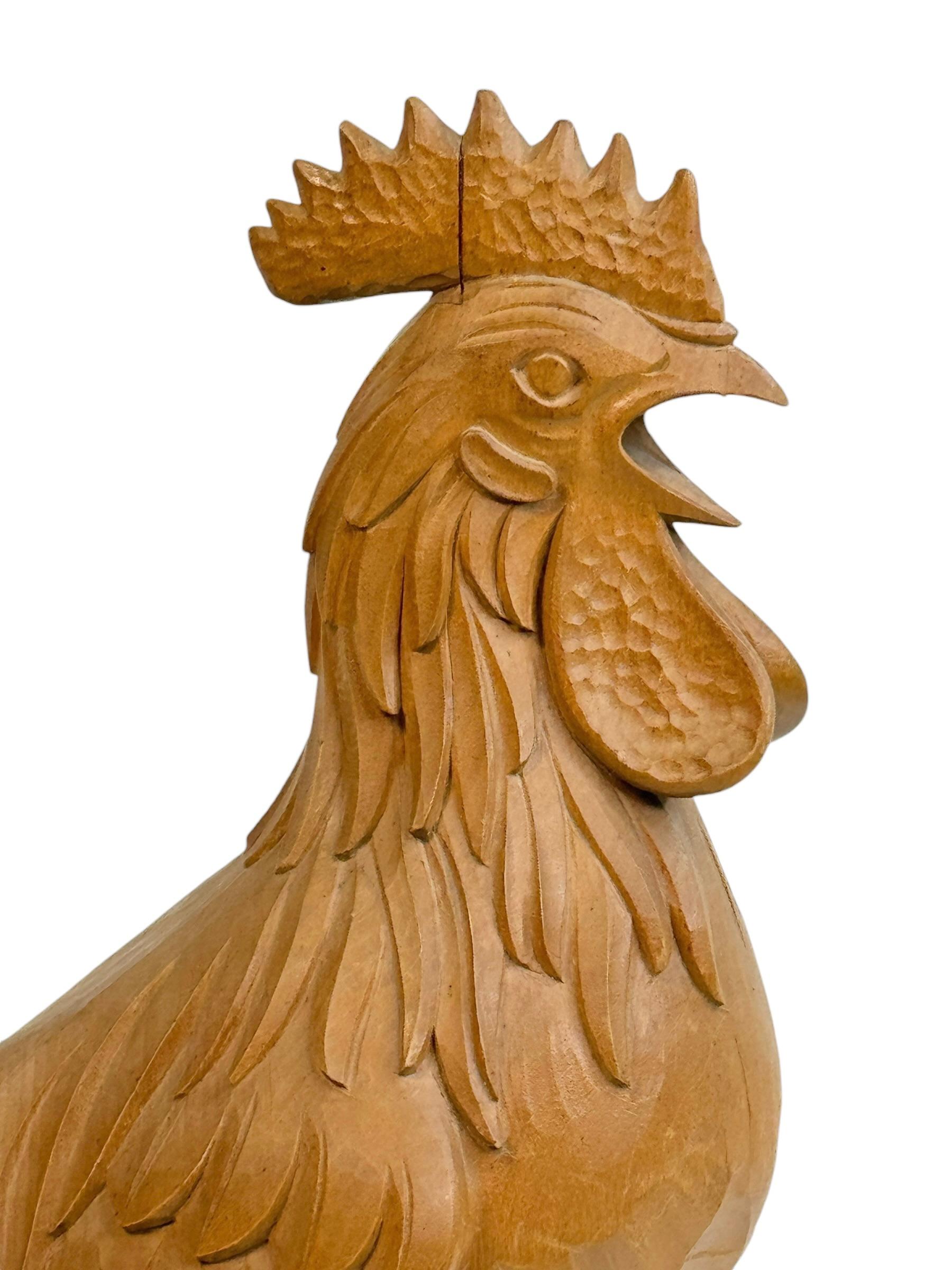A great looking hand carved original wooden Folk Art Rooster Statue. A great piece for a suitable ambiance in a Cabin room or the office of a Hunter or Woodsman. More than likely one of the Folk Art items made in the 1960s from a well known wood
