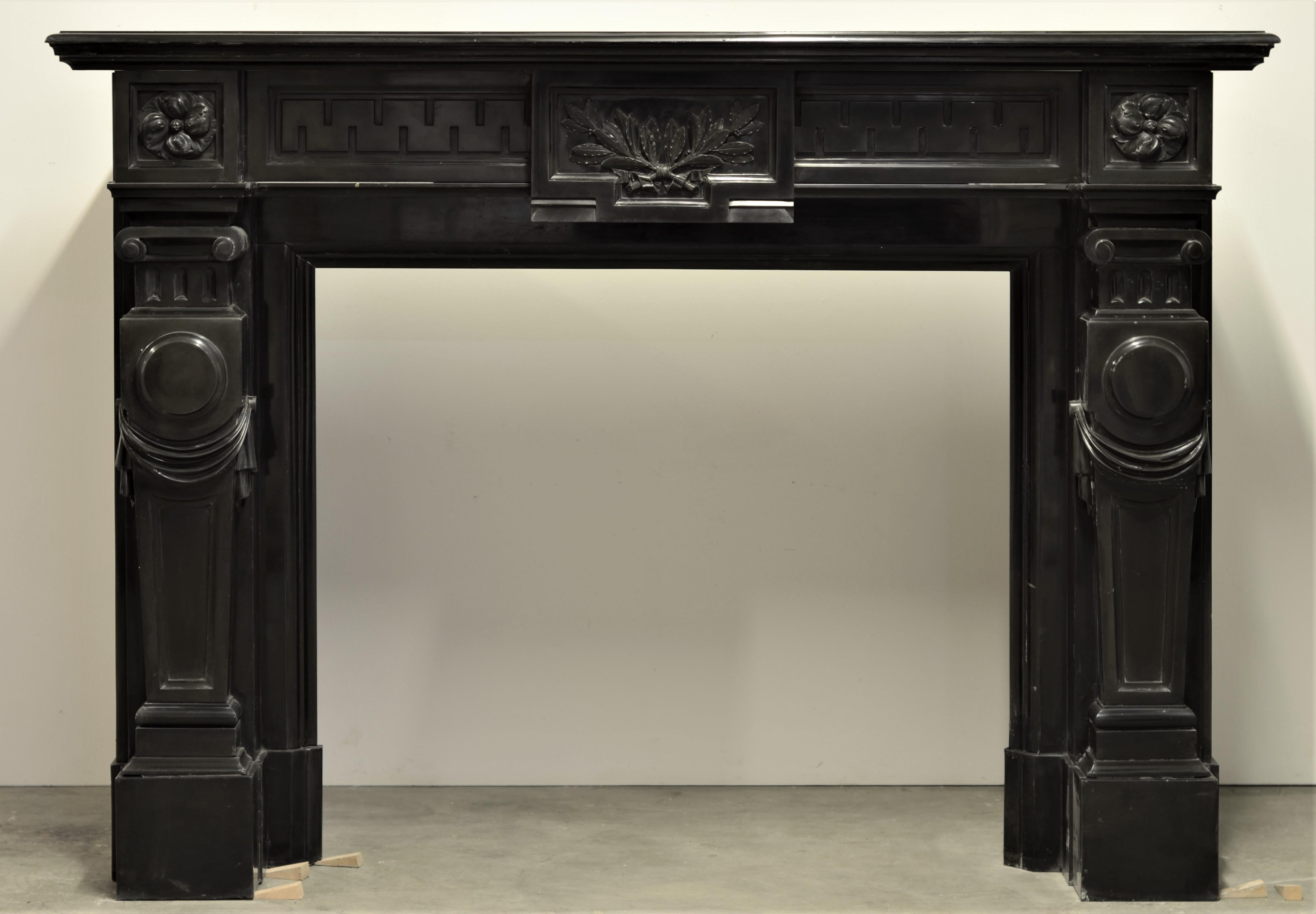 Monumental black marble Louis XVI fireplace mantel

Very impressive 19th century Louis XVI fireplace mantel in Belgian black marble.
The delicate floral carvings and strong lines make this a true statement piece.

It has the perfect proportions