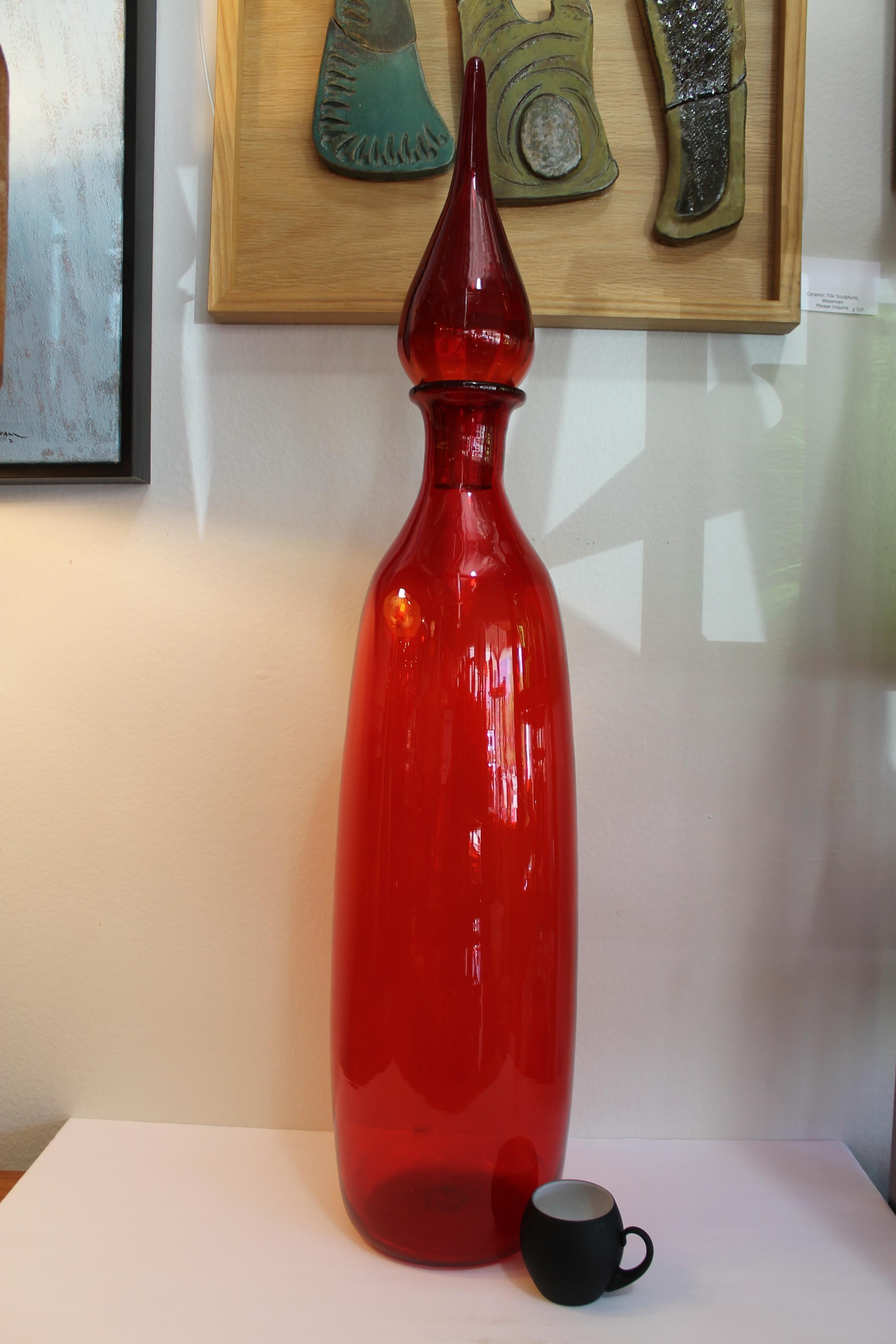 Large Blenko ruby red floor vessel/bottle with stopper by Wayne Husted. Bottle (without stopper) is 26.5