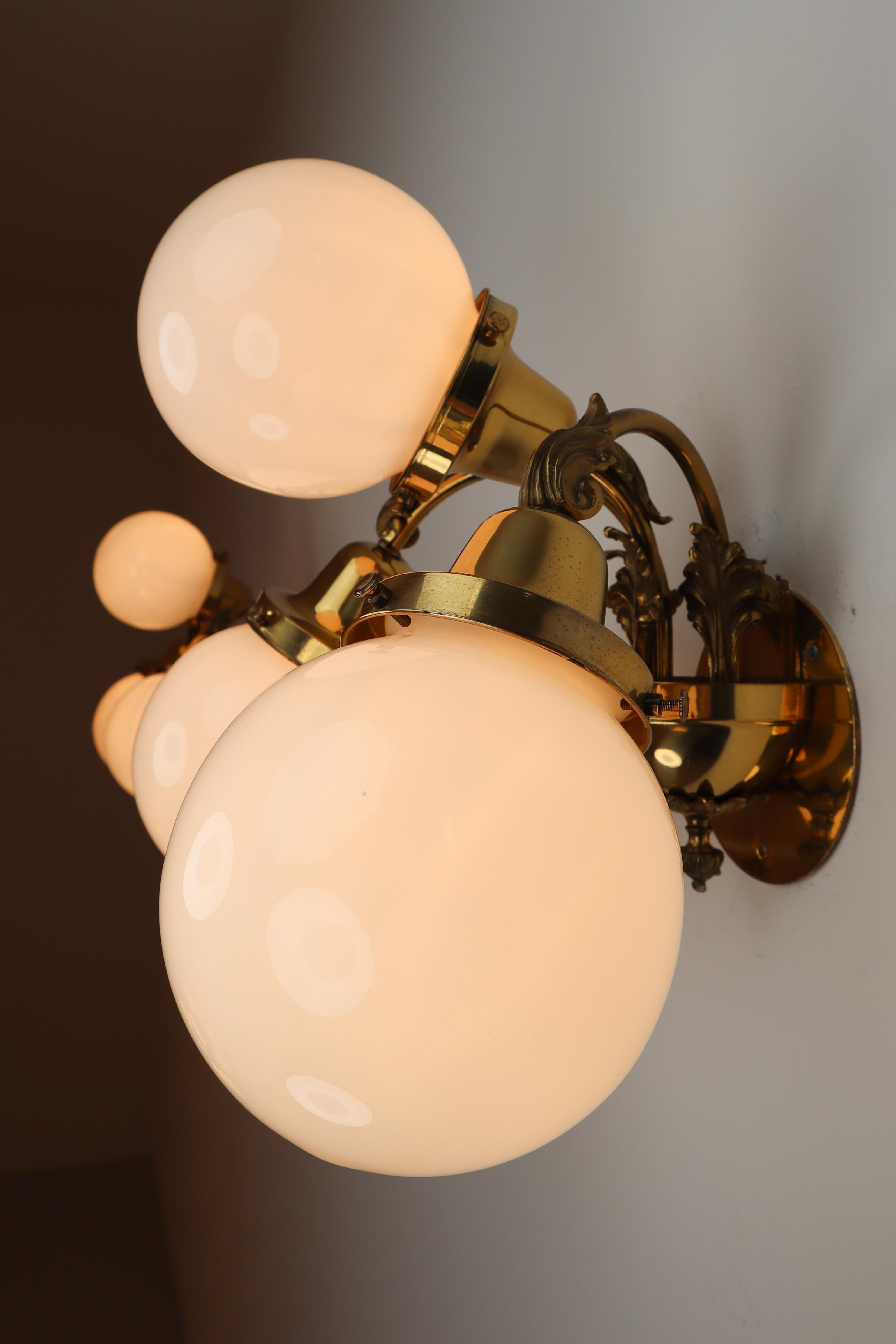 Monumental Brass Chandelier and Four Wall Lights with Opaline Glass Globes 12