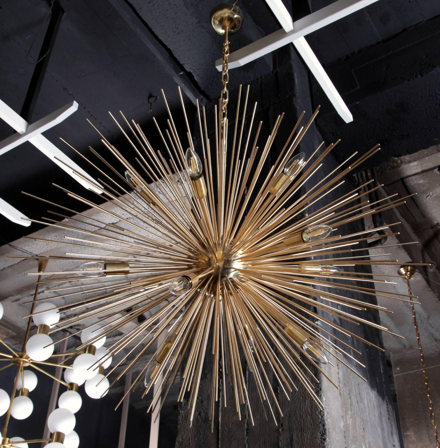 Very huge brass Sputnik or Urchin chandelier. The chandelier has a very impressing size and is a real eyecatcher in every room. The chandelier is in excellent condition.
12 x E14 bulbs.