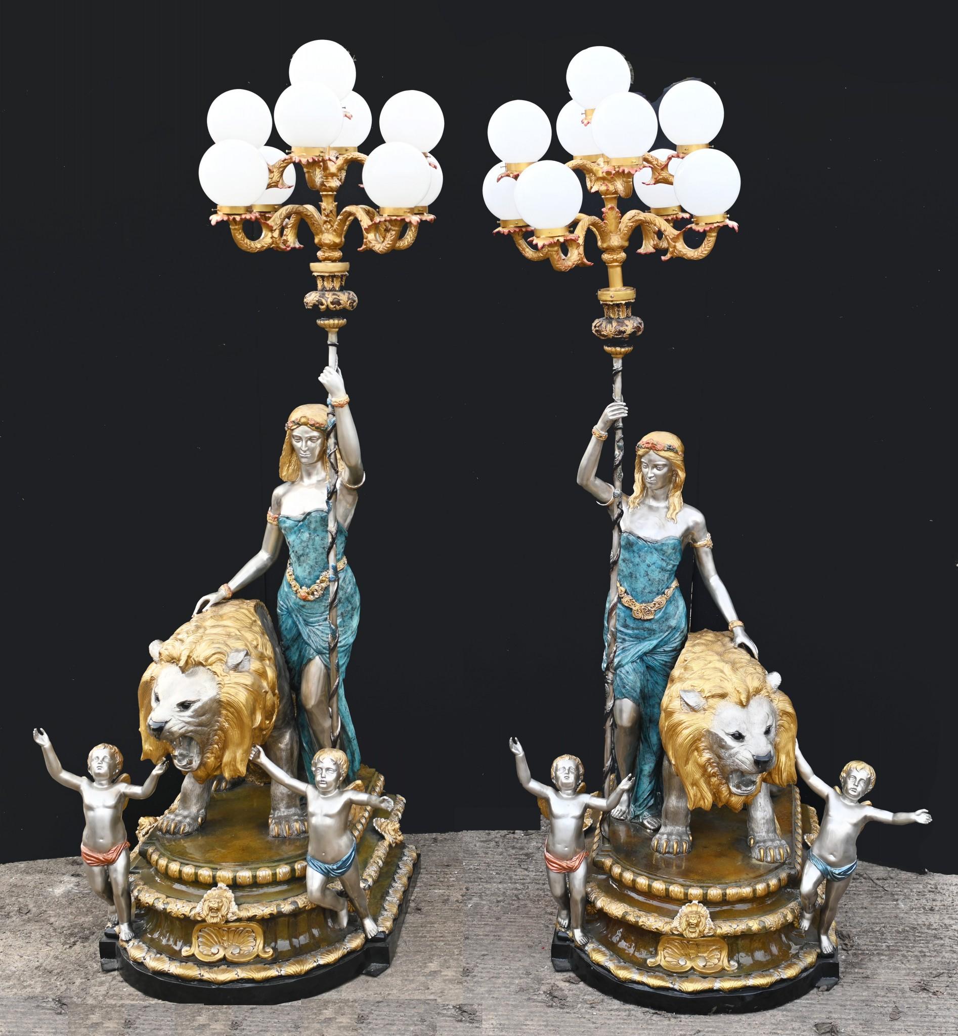 Wow - stunning pair of giant Italian bronze candelabras
stand in at ten feet tall - 304 CM over three metres!
Glorious polychrome finish to the statues
Main candelabras are held aloft by the female maidens
Flanked by the roaring lions and pair
