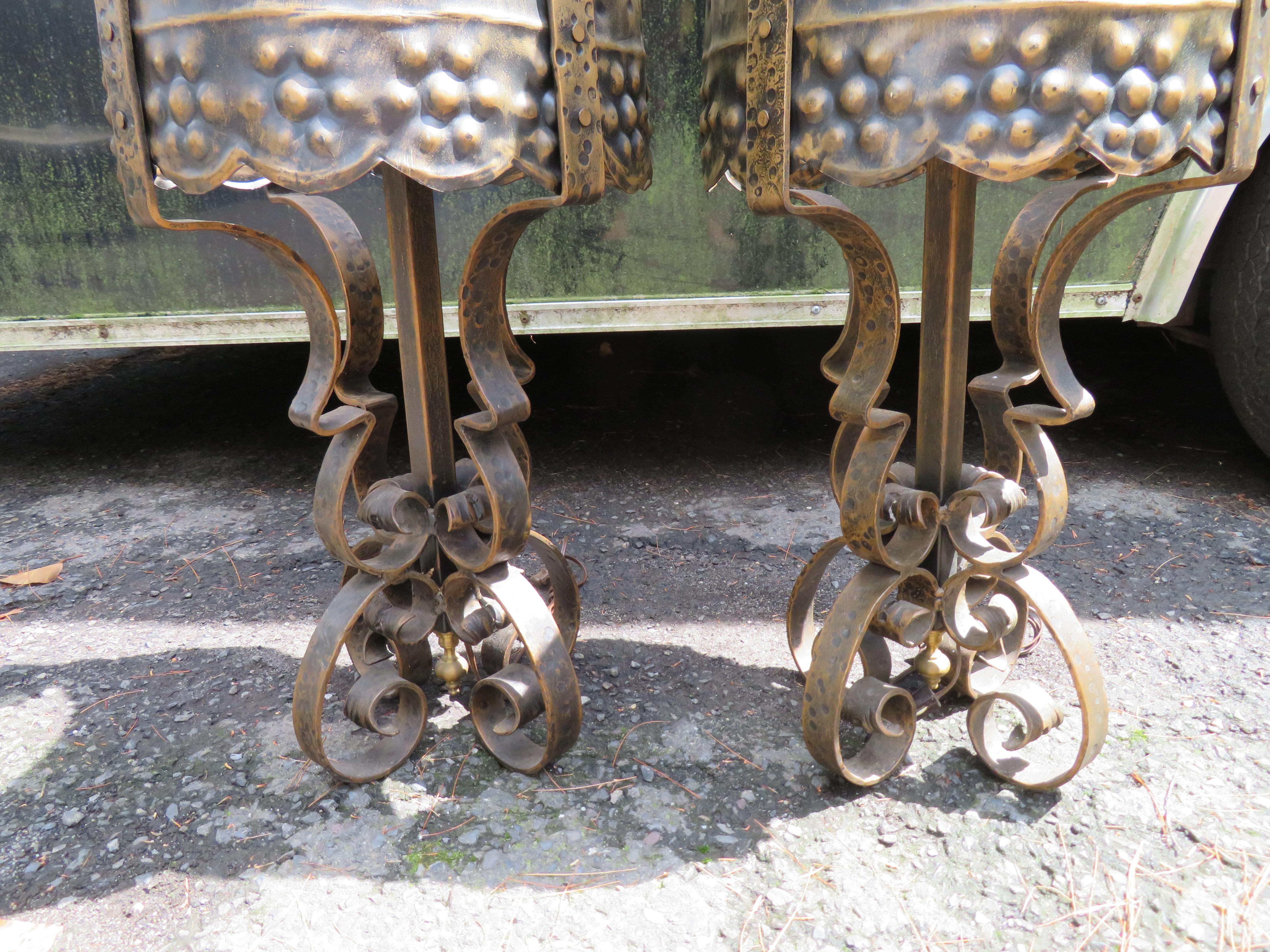 Monumental pair of Tudor Gothic Revival scroll lamps with attached hammered metal shade. These huge lamps are amazing in person and make a huge statement. They measure 32.5