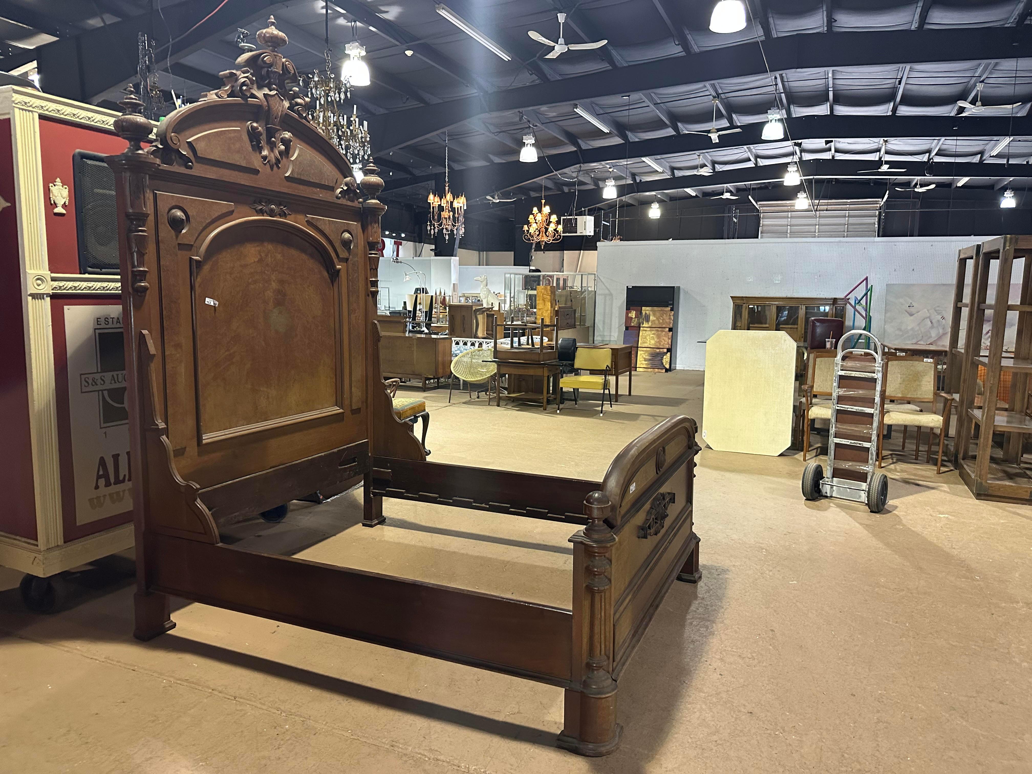 This is a superb solid carved walnut American Victorian bed that is sized closest to a standard queen Size bed. The interior dimensions are 75.5 long x 60.5 wide in between the rails, however we STRONGLY recommend getting the bed in your home before