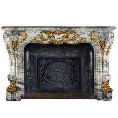 Monumental Carved Marble and Ormolu Fireplace in the Louis XV Manner