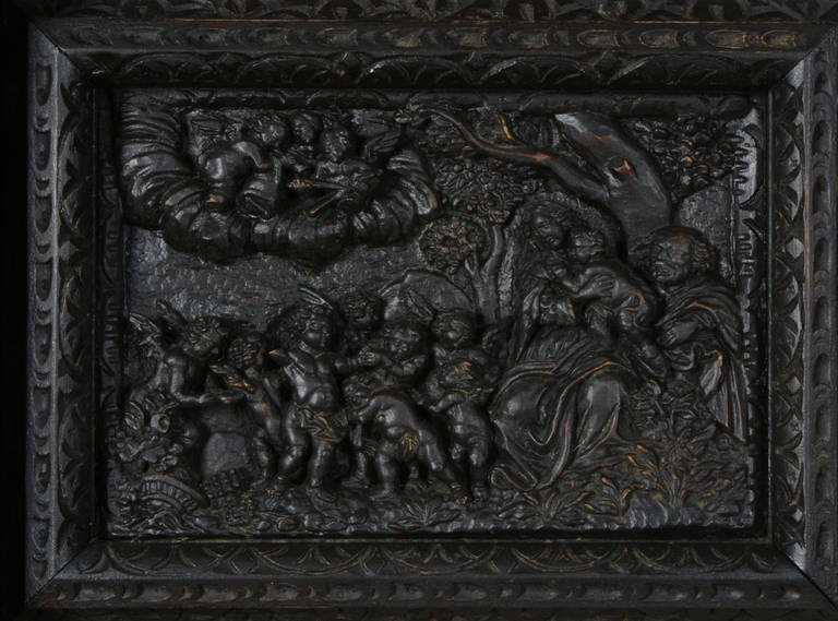 A highly carved extremely large fire surround the jambs in candy twist form decorated with birds picking berry’s the over mantel set with highly carved panels

 It is are opinion that this huge over mantel was reconstructed in the mid-19th century