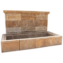 Monumental Carved-Stone Wall Fountain with a Double Spout and a Large Basin.