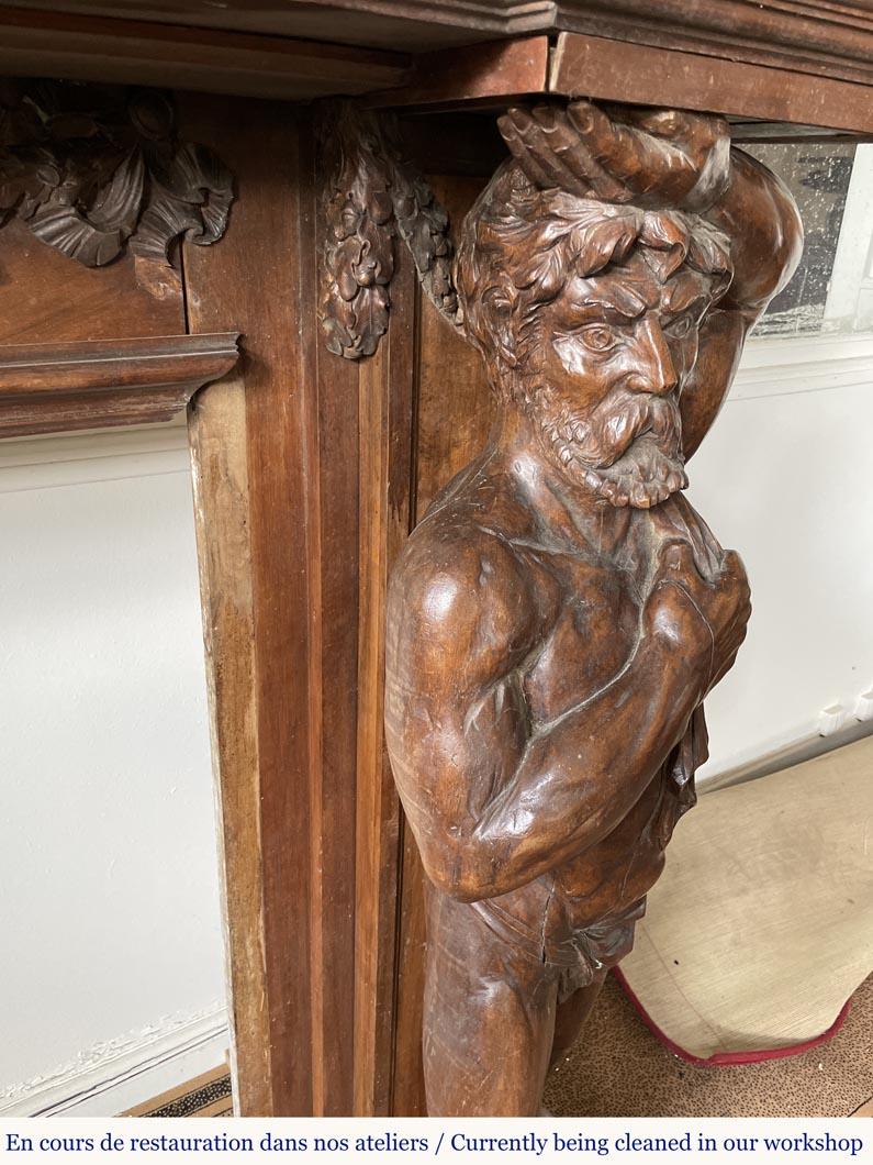 Monumental carved walnut fireplace with atlantes and painted medallion For Sale 2