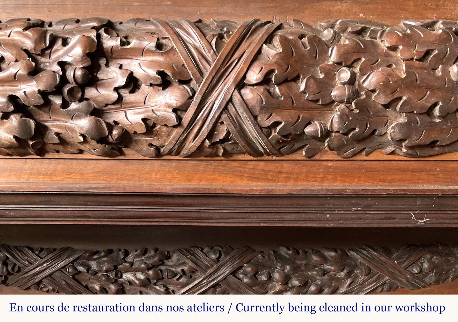 19th Century Monumental carved walnut fireplace with atlantes and painted medallion For Sale