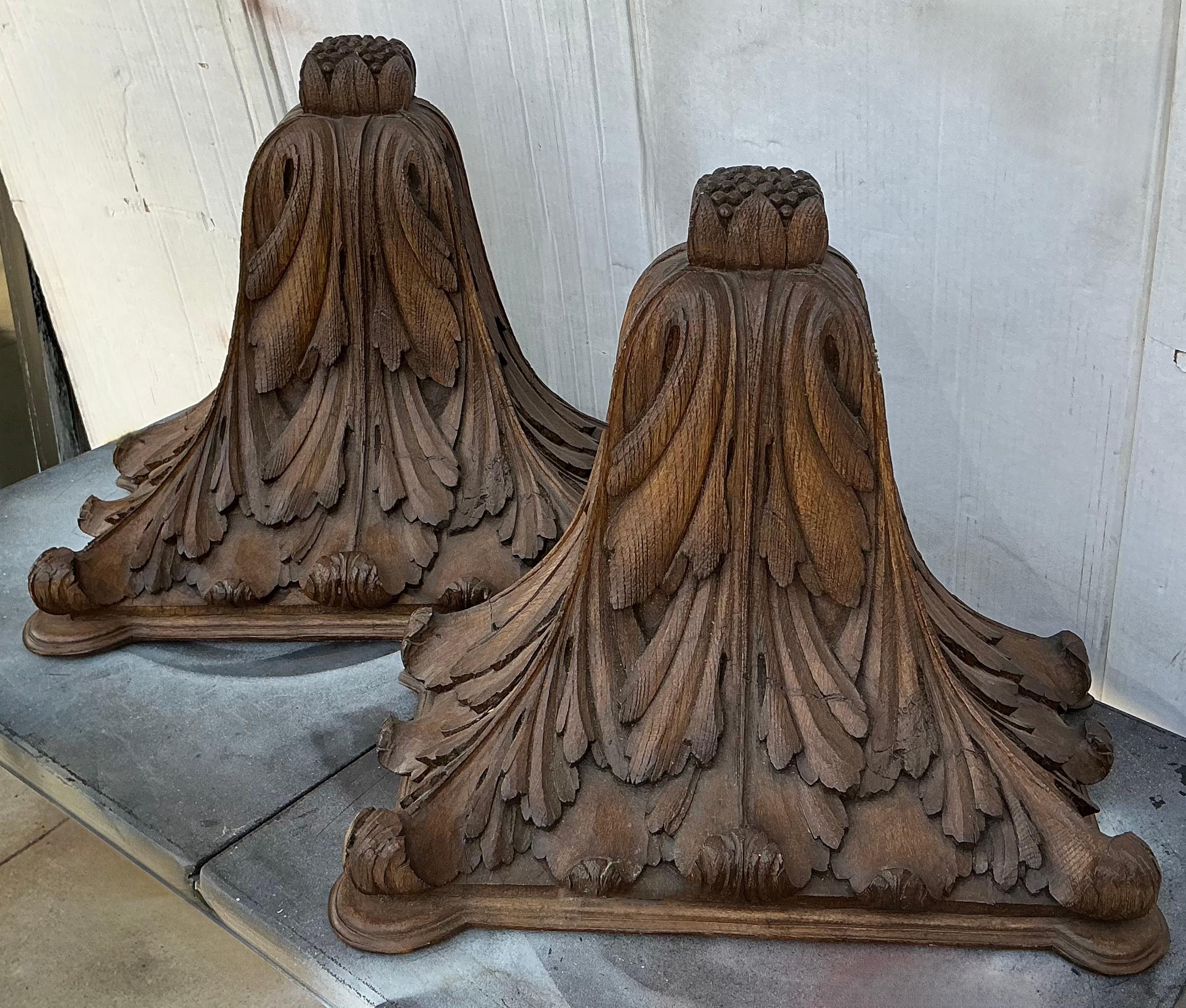 This is an excellent pair of large scale cast composition faux bois wall brackets. Their dramatic size at almost twenty inches in length enable them to make a bold statement. They are unmarked and date to the later part of the 20th century. 