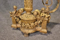 Monumental Cast Gilded Dor'e Bronze French Regence Andirons with Cherubs