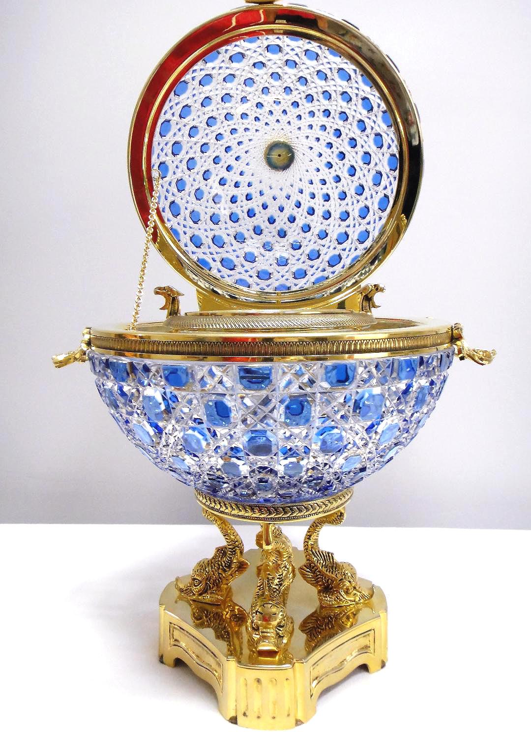Monumental Caviar Bowl by Cristal Benito

Offered for sale is a monumental 20 inch tall cut crystal and 24-karat caviar bowl with a hinged lid by Cristal Benito originally designed as part of the 1950s collection. This spectacular piece is made in