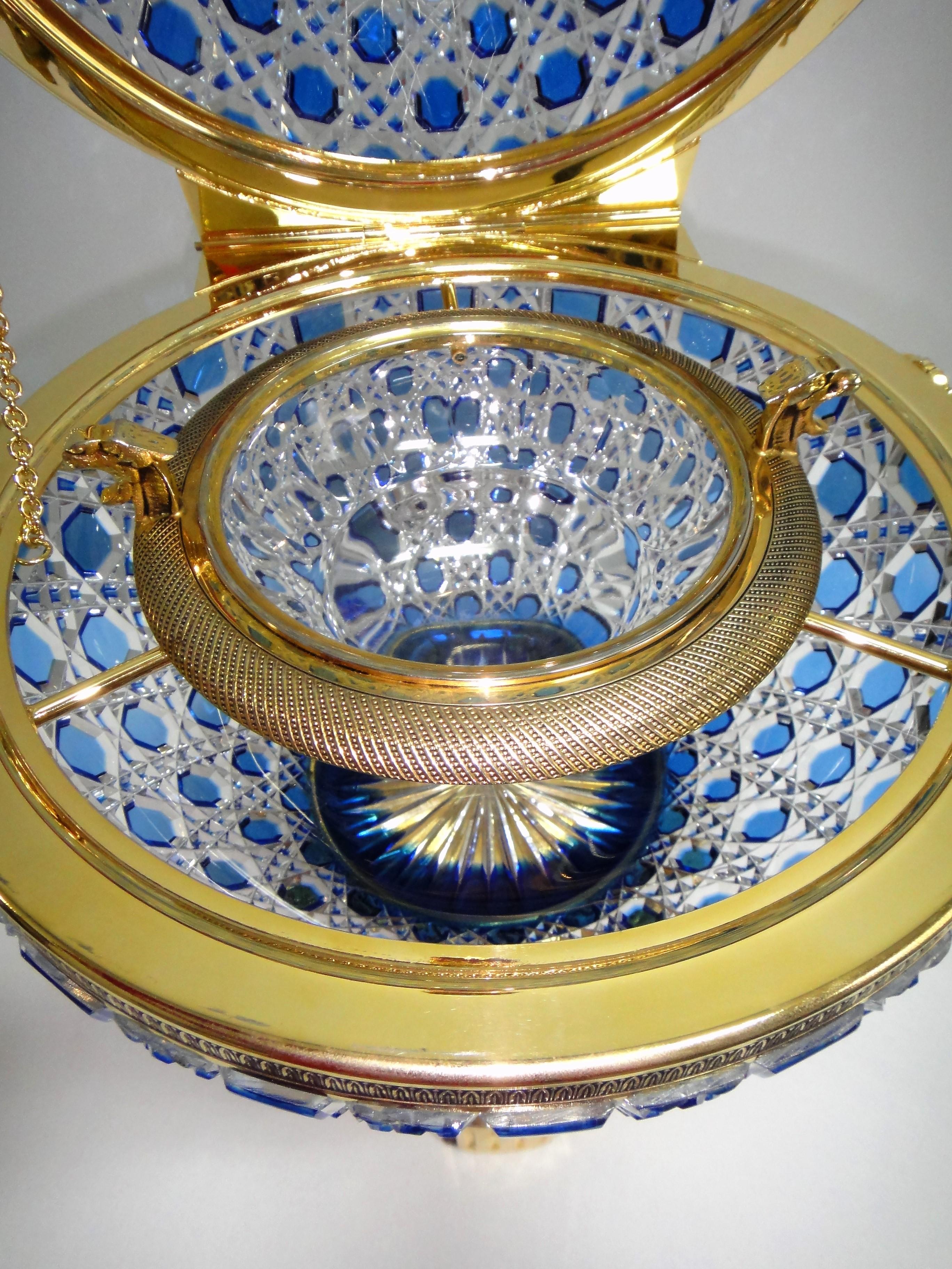 Monumental caviar bowl by crystal Benito Offered for sale is a monumental 20 inch tall cut crystal and 24-karat caviar bowl with a hinged lid by crystal Benito originally designed as part of the 1950s collection. This spectacular piece is made in