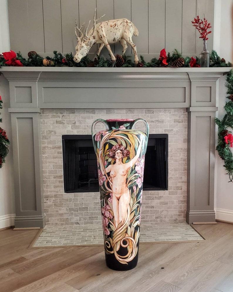 A magnificent and impressive sized vigilia palazzo Italian mid-century hand painted ceramic vase with handles. Hand-crafted in Tuscany, Italy, the exceptionally executed tall vase features rich polychrome decorated image of a nude woman wrapped in