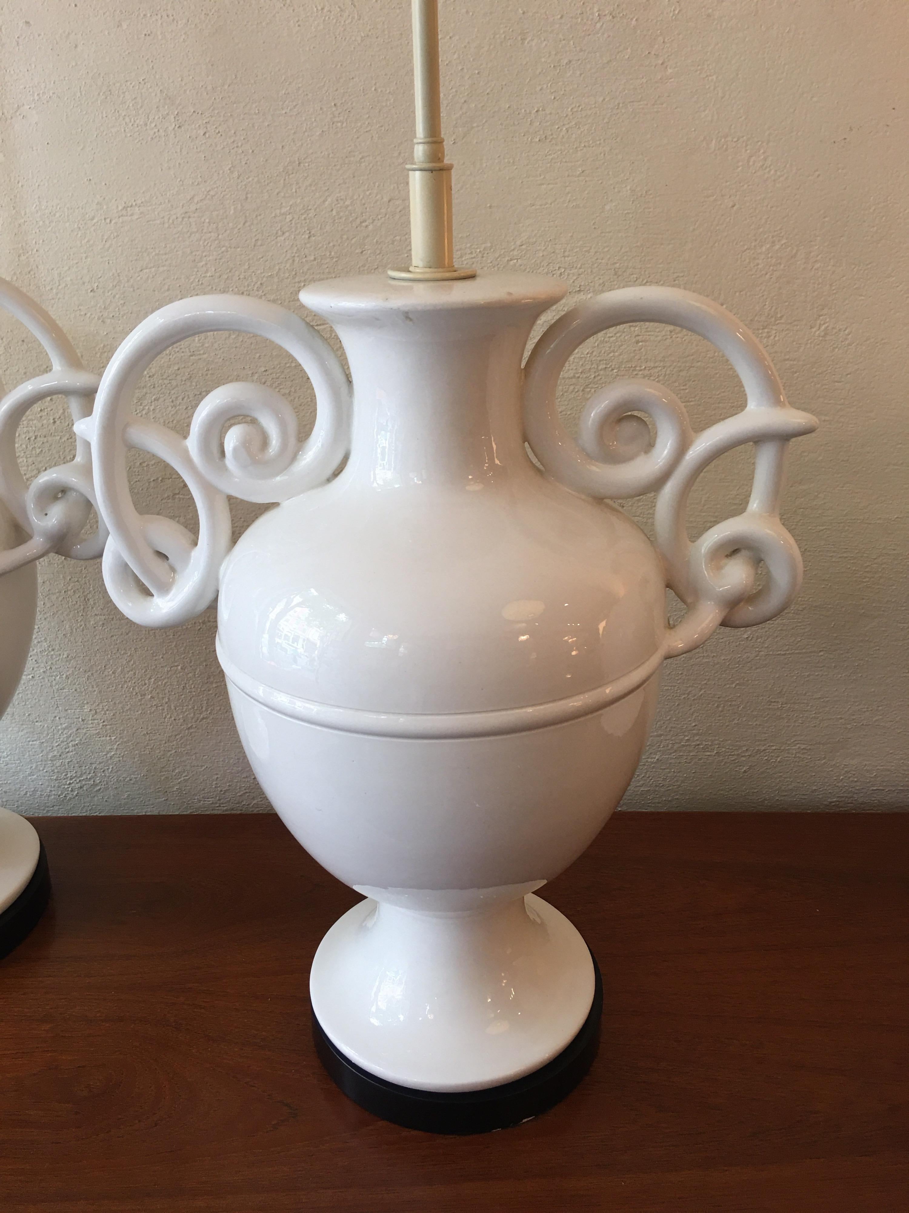 Monumental ceramic Italian urn lamps with curly handles. Amazing scale and look! These beautiful lamps can carry any room! Dating to the 1960s these lamps are in pristine condition with original shades.
