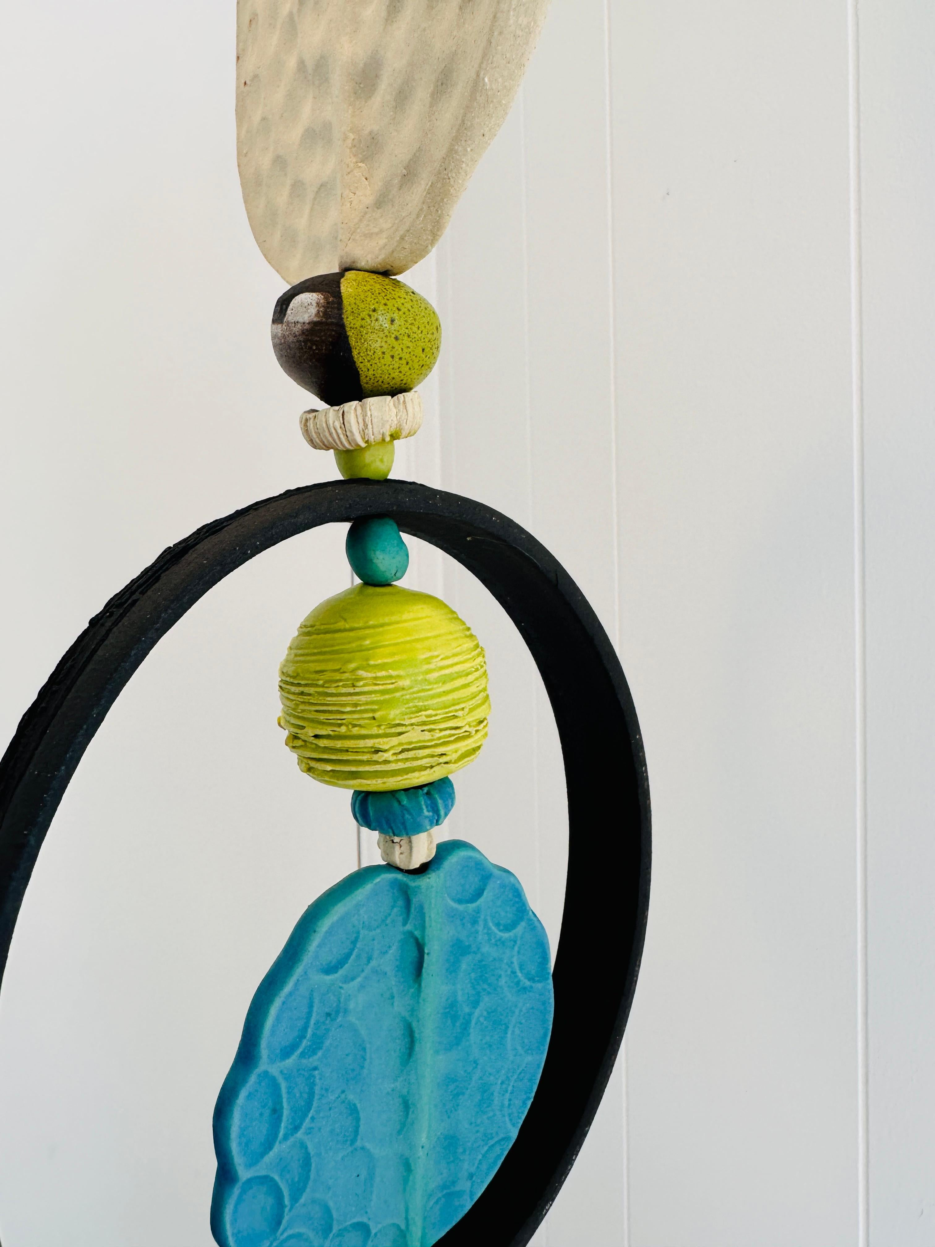 Hand-Crafted Monumental Ceramic Kinetic hanging sculpture hand crafted by Brenda Williams