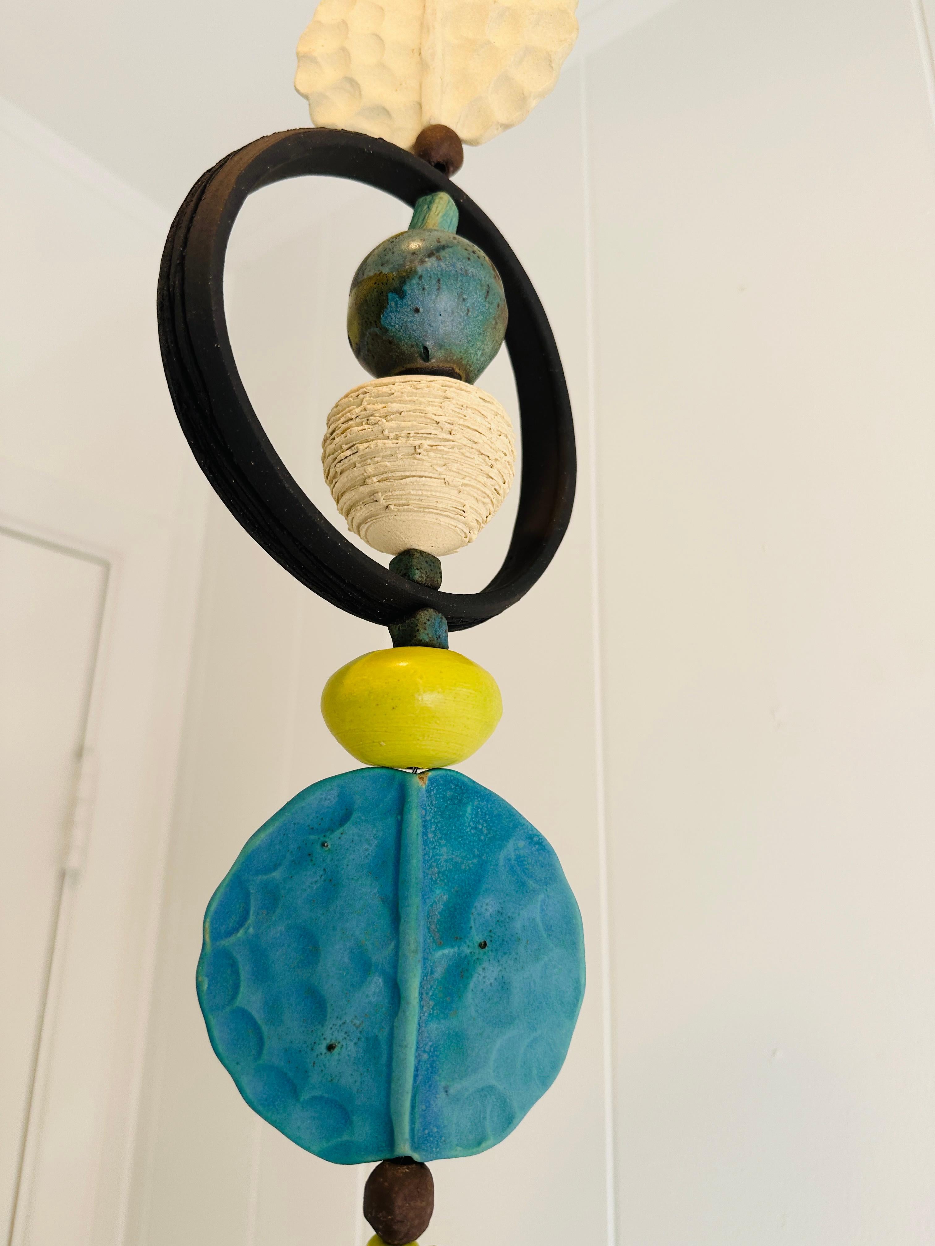 Monumental Ceramic Kinetic hanging sculpture hand crafted by Brenda Williams In Excellent Condition In Buffalo, NY