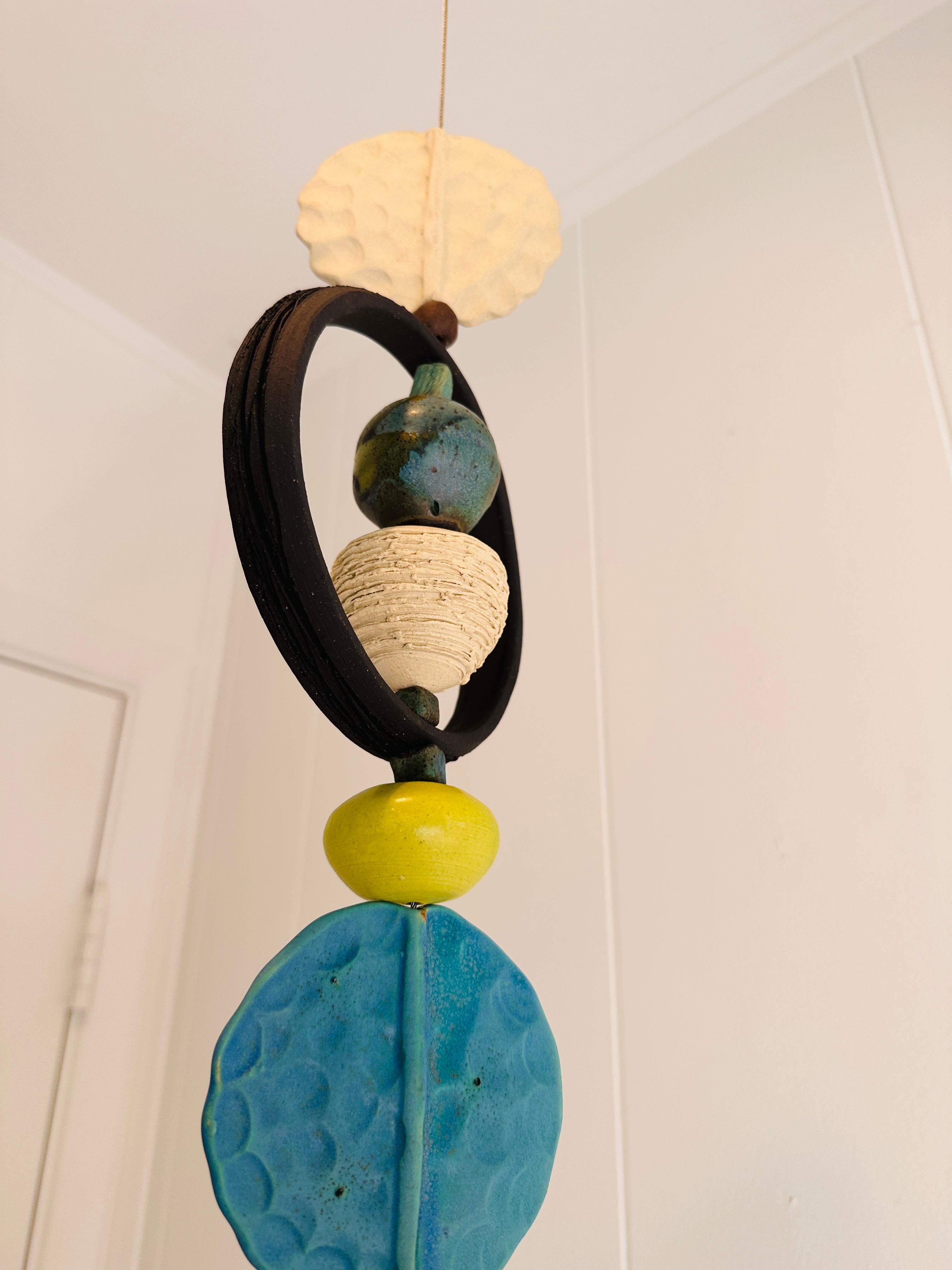 Contemporary Monumental Ceramic Kinetic hanging sculpture hand crafted by Brenda Williams