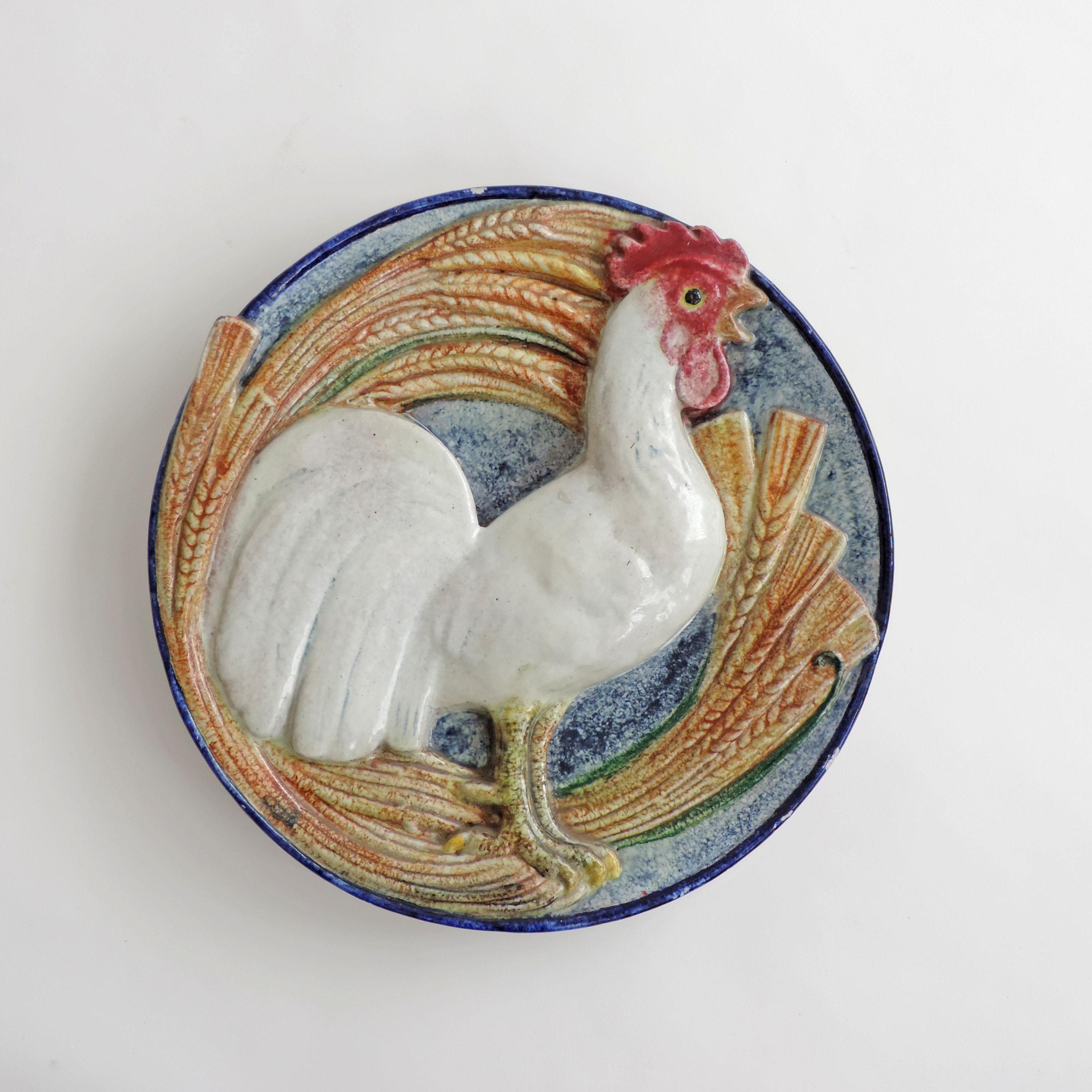 Monumental ceramic wall plate with a chicken 
Signed A.R.