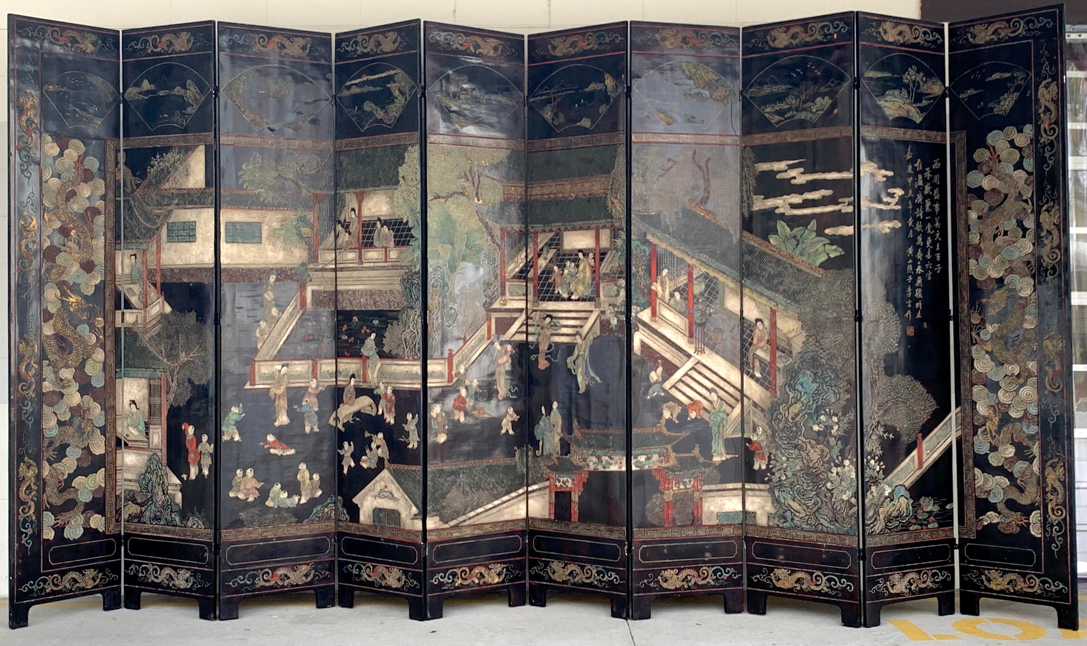 Monumental Chinese Coromandel Kuancai Screen, Consisting of Ten panels, each one with fine incised 'kuan cai' decoration of court scenes. Signed on the 2nd to the right panel. The back is undecorated.
The screen stands 92-Inches High (7'6), Each