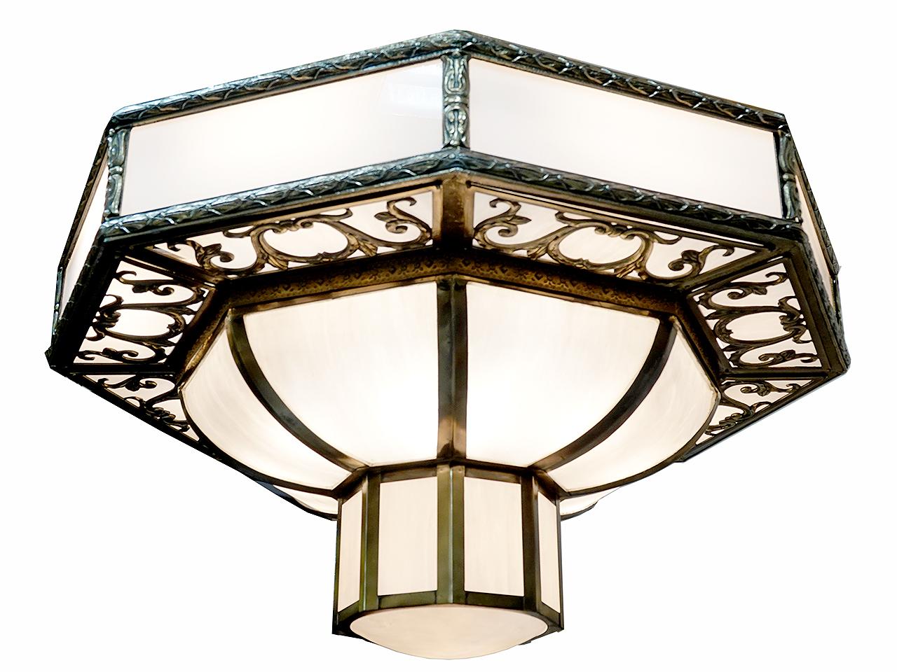 This is a large impressive chandelier that has a four foot diameter. The hight is only three foot which allows for lower ceiling heights. I also like that its design is not a fussy and can work with many design styles. The frame is all bronze with