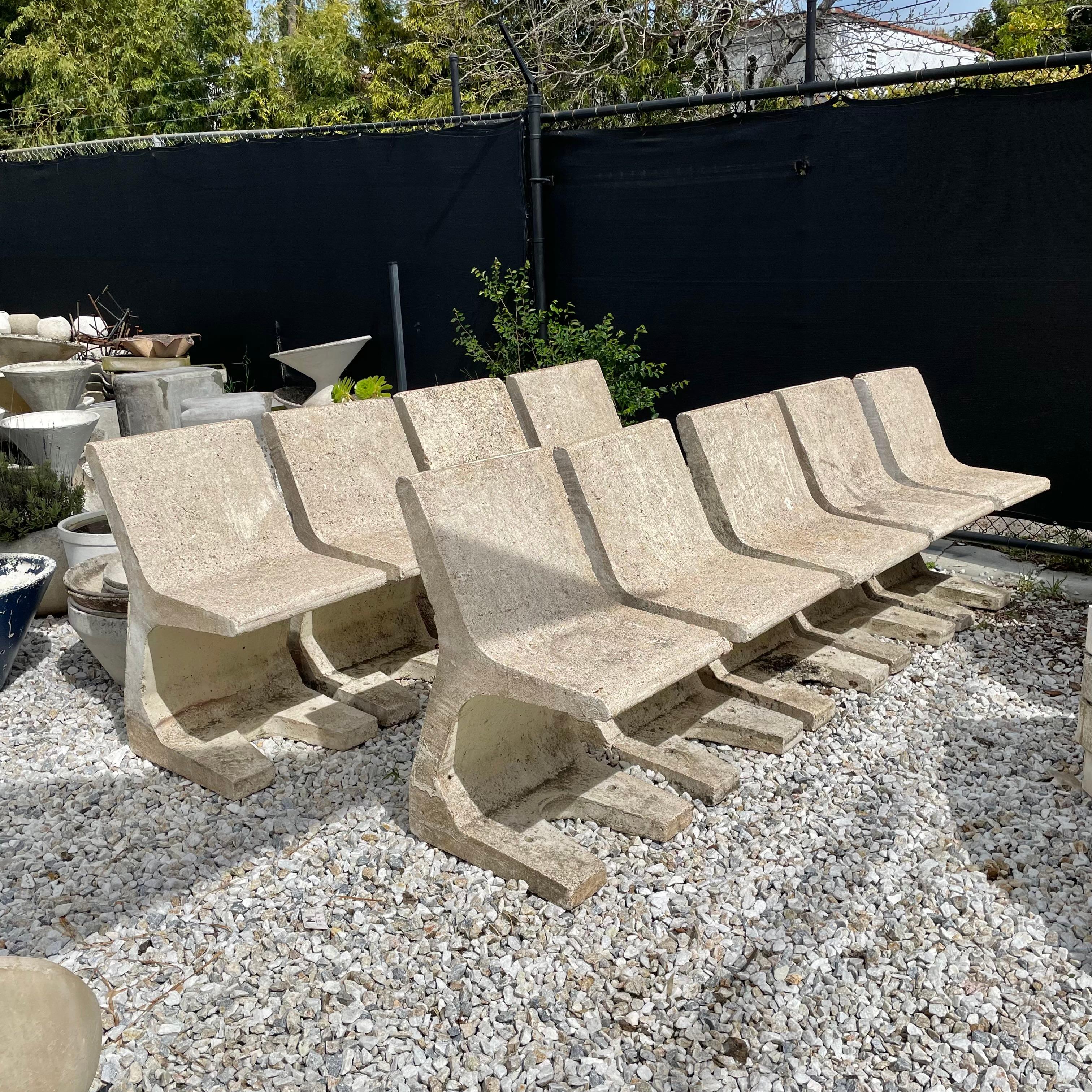 Absolutely stunning concrete chairs with a forked base. Extremely rare and made of a tan aggregate ranging between coarse and fine. The unique sculptural design of these chairs allows them to be introduced into any design story with ease. Prominent