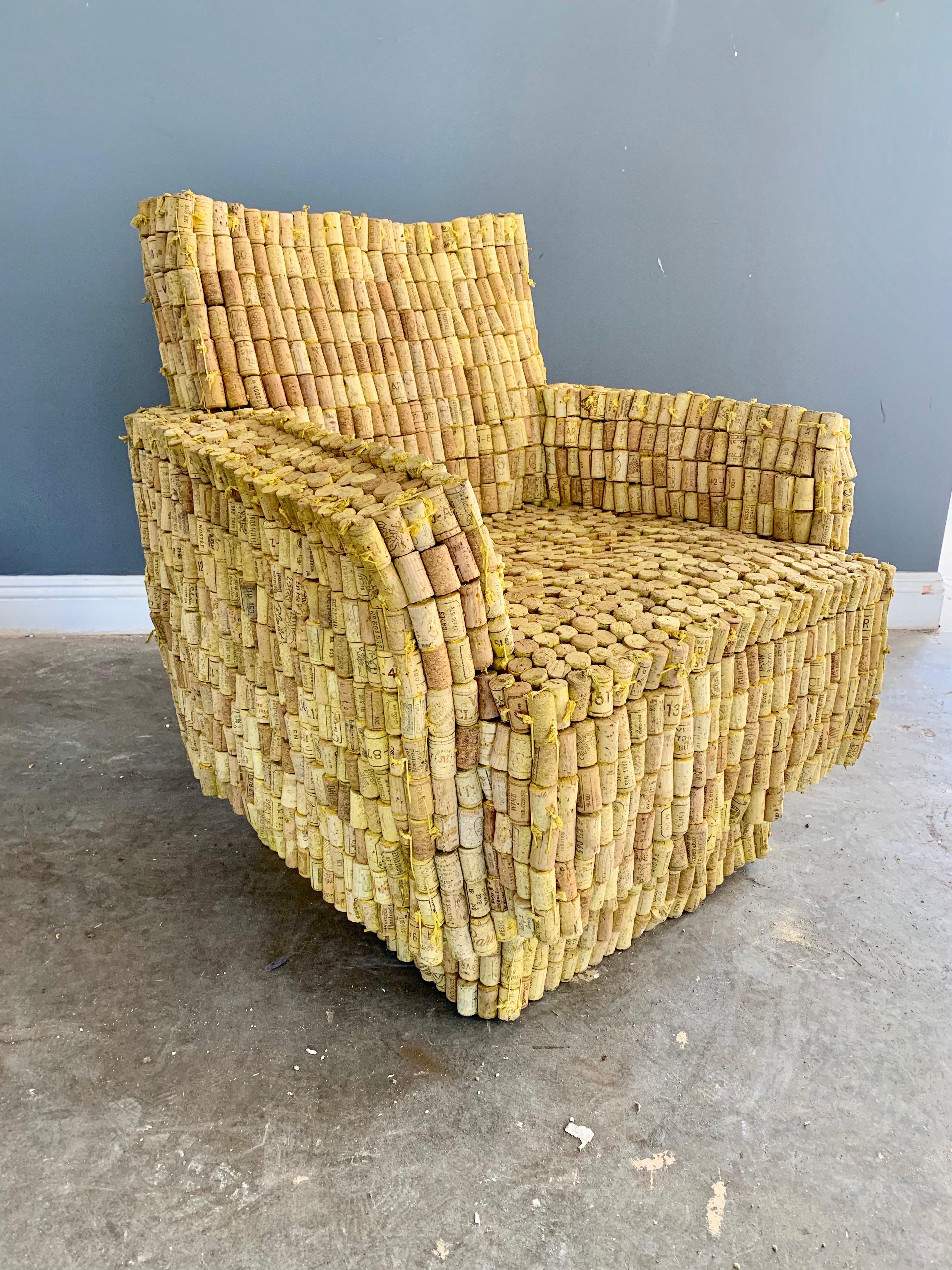 Fantastic armchair made entirely of cork. Wooden frame underneath. Chair is handmade by stringing hundreds of pieces of cork together. Very sturdy and extremely comfortable. Super cool piece of art and functional seat. Perfect for a wine cellar or