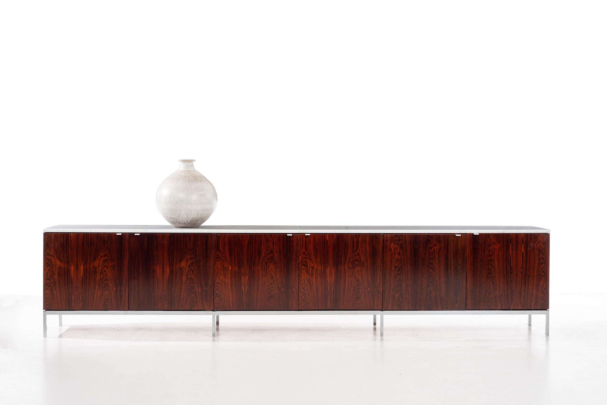 Florence Knoll design for Knoll International, Credenza from a Palm Springs, California residence. (large vase by Clyde Burt, sold separately)
Features, heavily figured Brazilian rosewood veneer.
Custom length 120