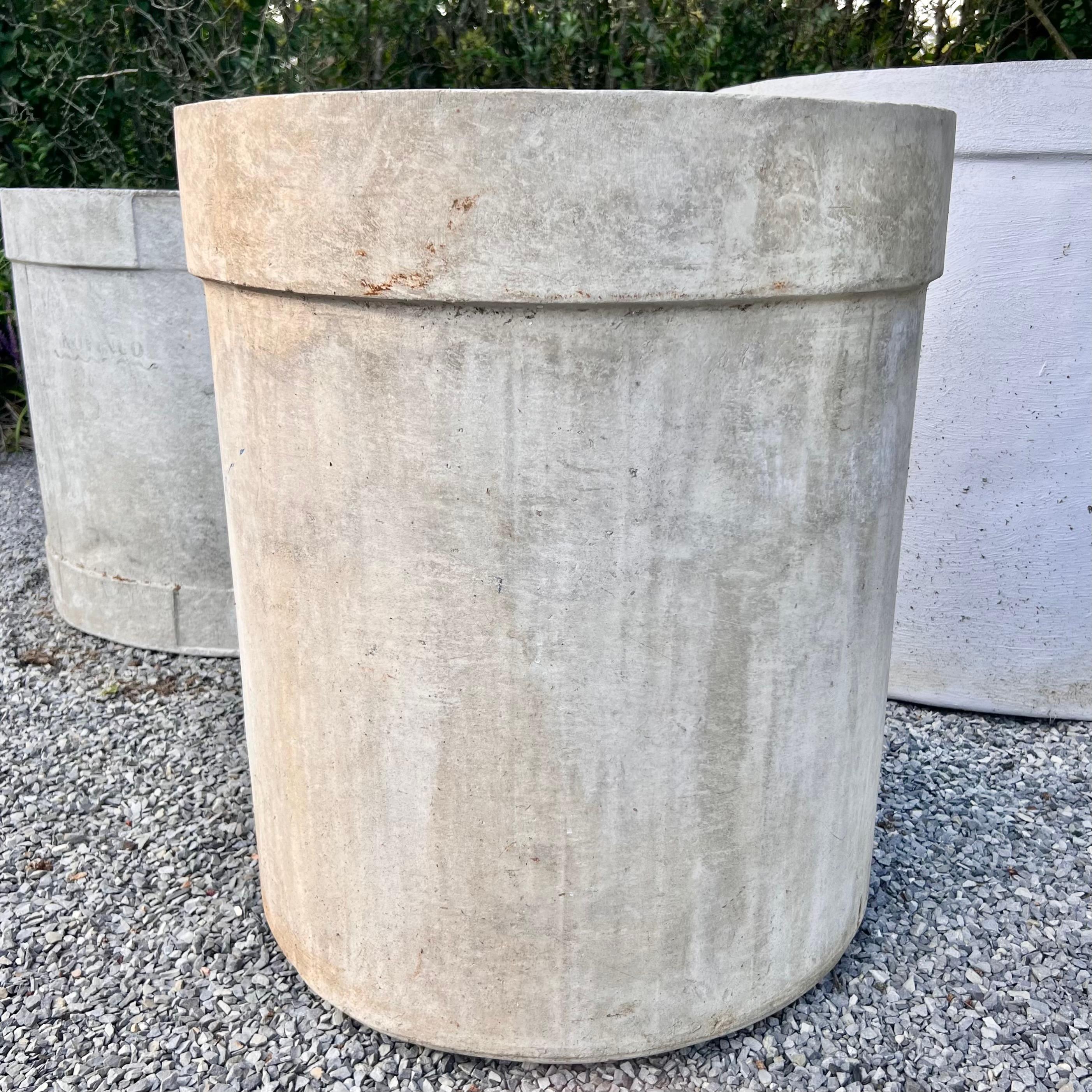 Gigantic tree planter by the Swiss design house Eternit. Very difficult to find vintage planters large enough to plant and hold a large tree. This would make a wonderful and functional piece for your home or garden. The planter features beautiful
